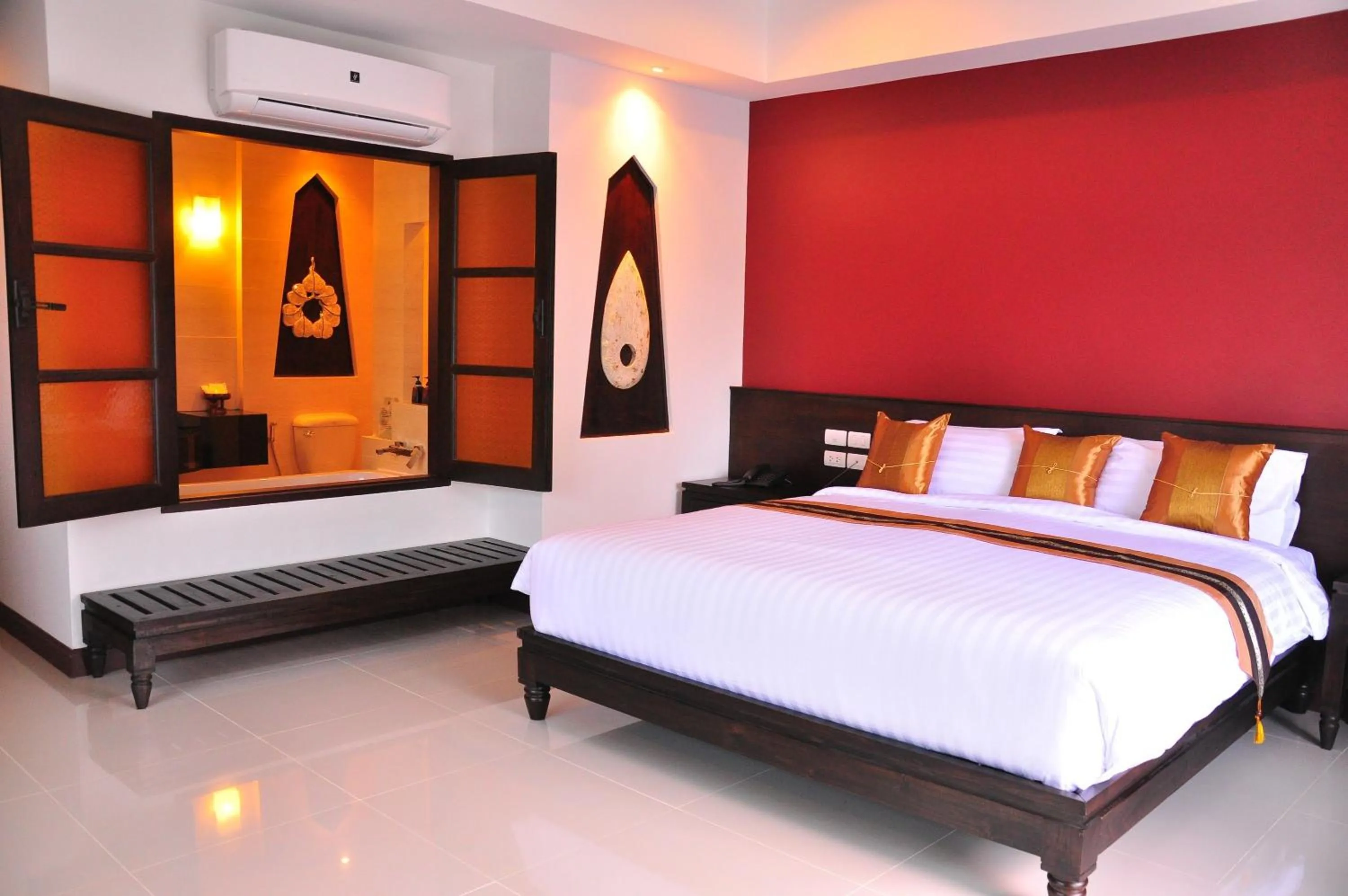 Bed in Navatara Phuket Resort