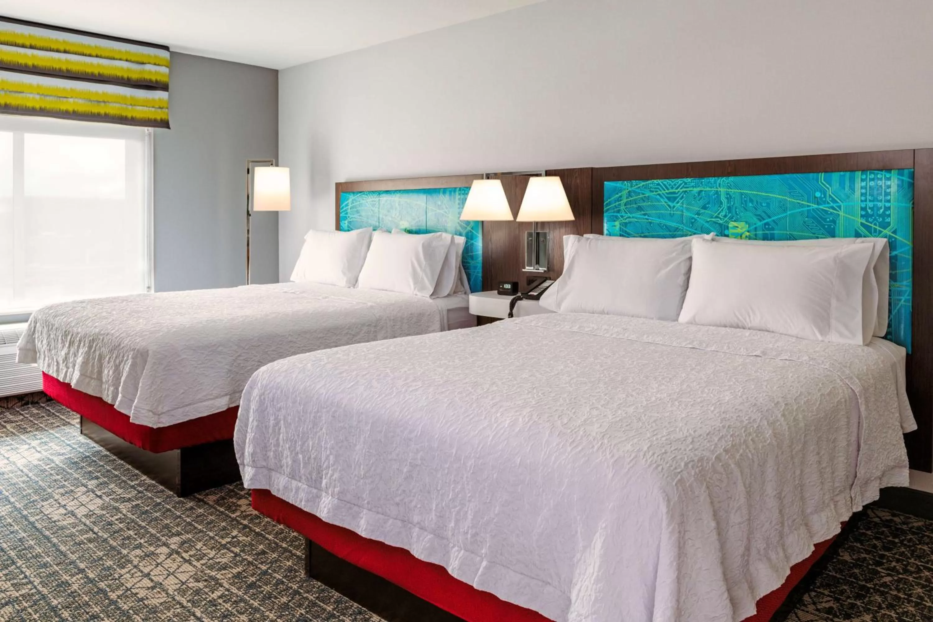 Bed in Hampton Inn & Suites Pittsburgh New Stanton PA