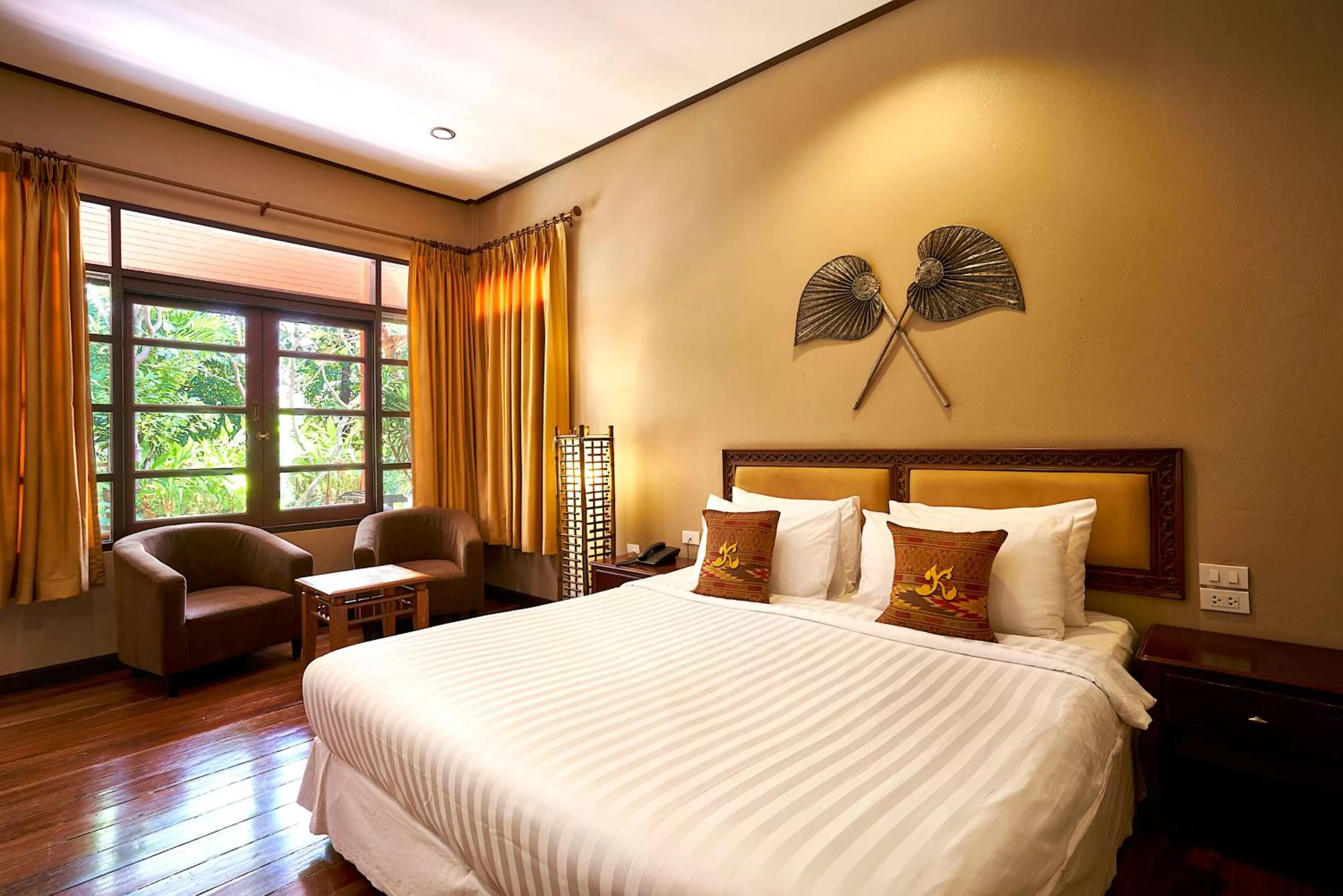 Bed in Ruenkanok Thaihouse Resort