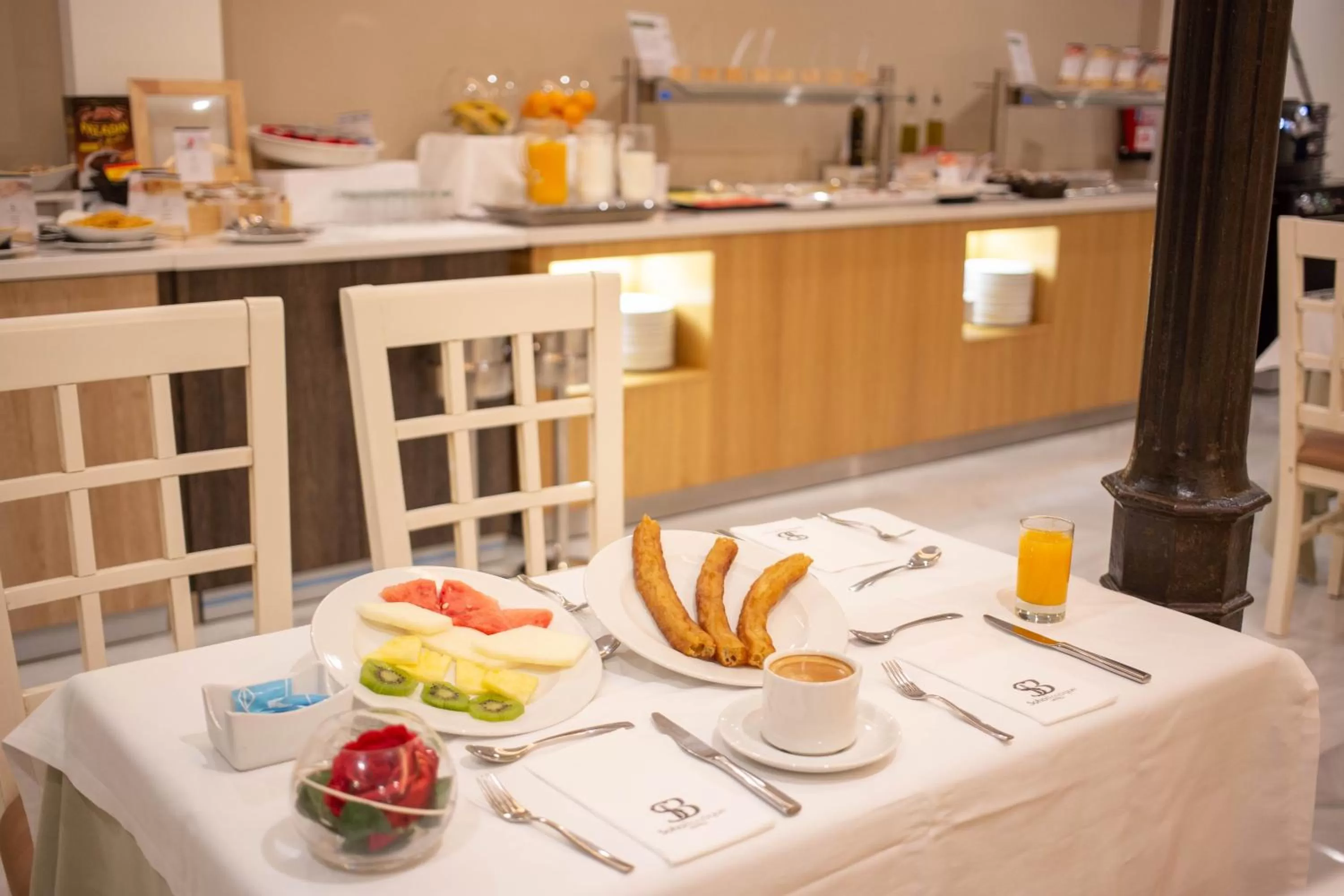 Buffet breakfast in Soho Boutique Capuchinos & Spa