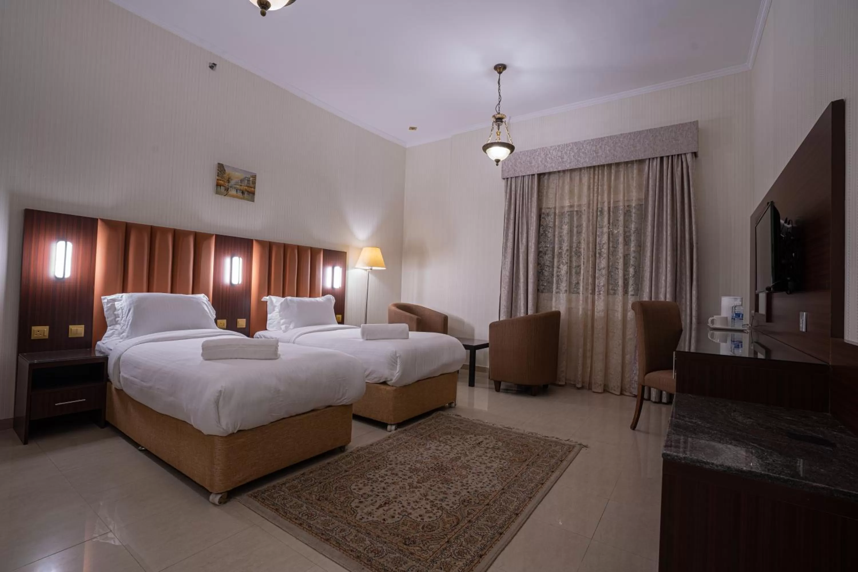 Bed in Vista City Hotel