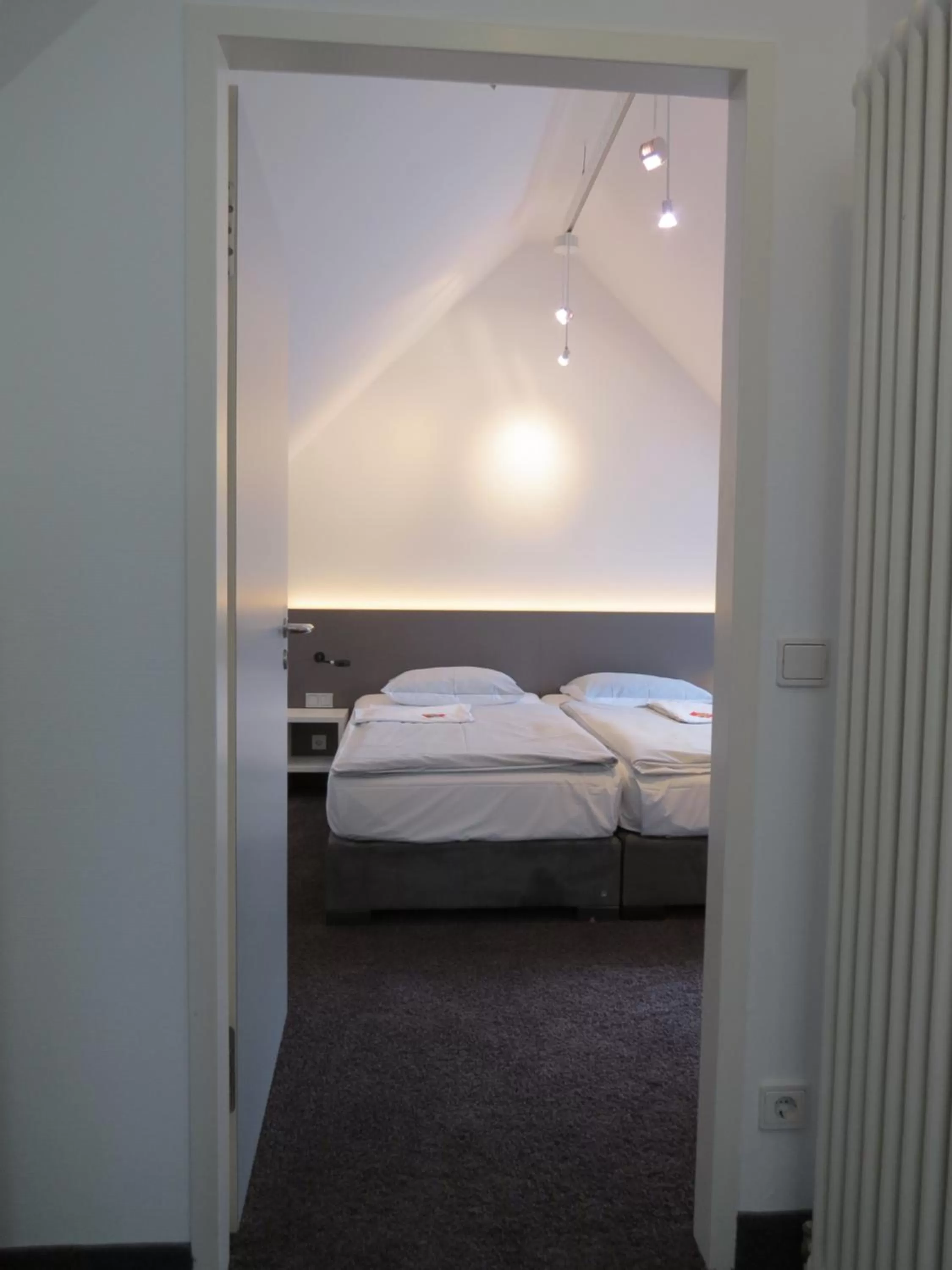 Bed in Comfor Hotel Ulm City