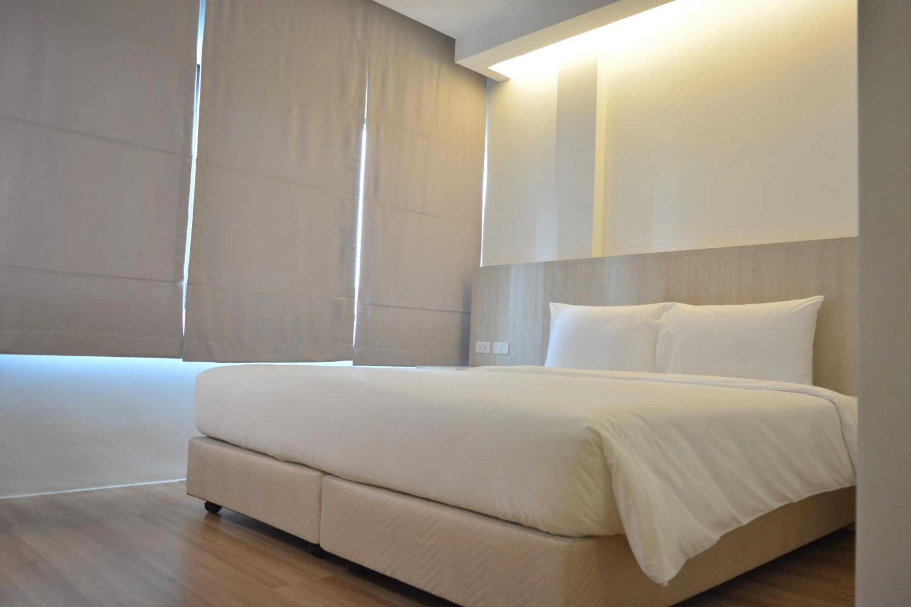 Bed in Rezt Bangkok