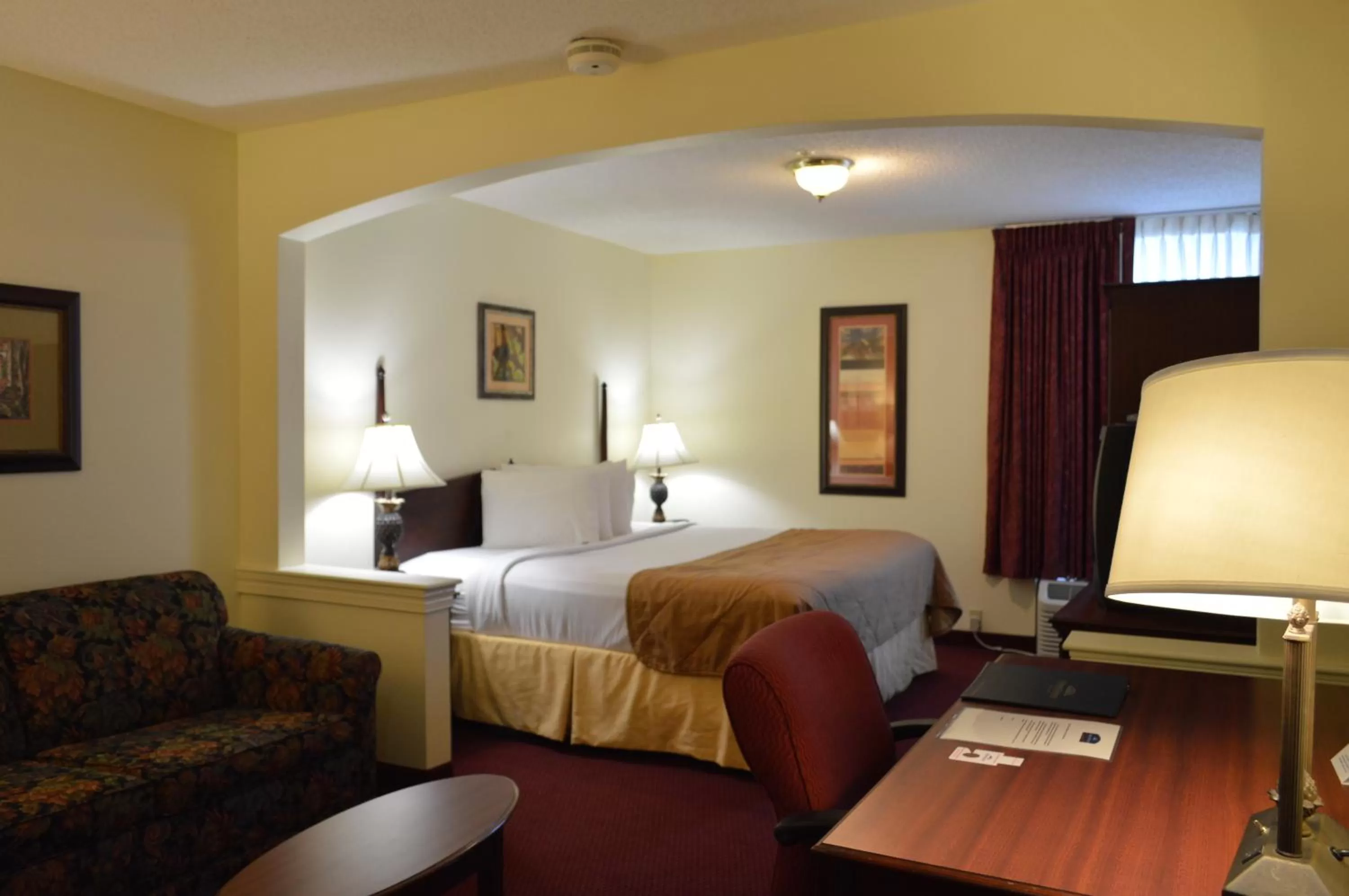 Bed in Opal Hotel & Suites