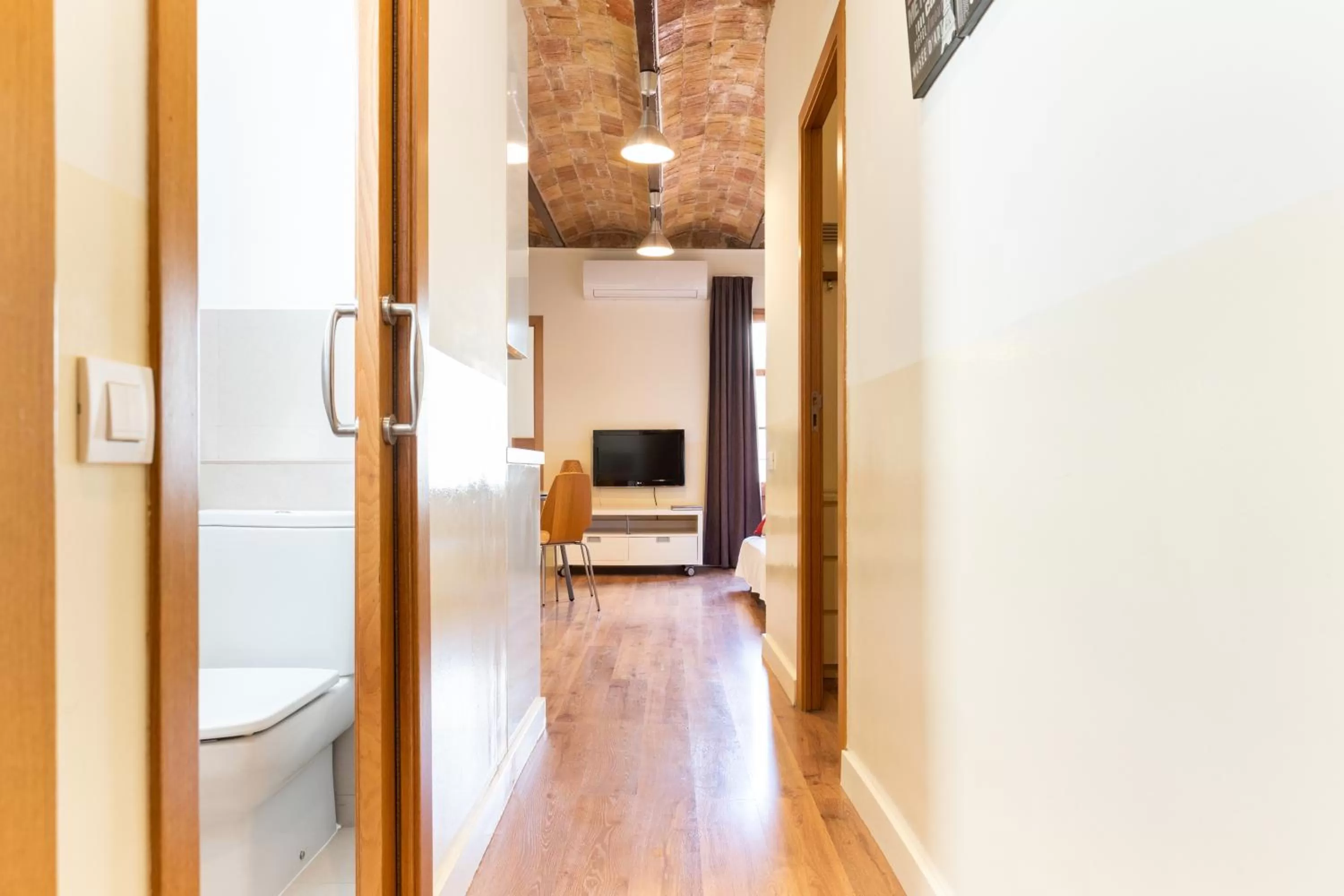 Toilet in Atica Apartments - by Weflating