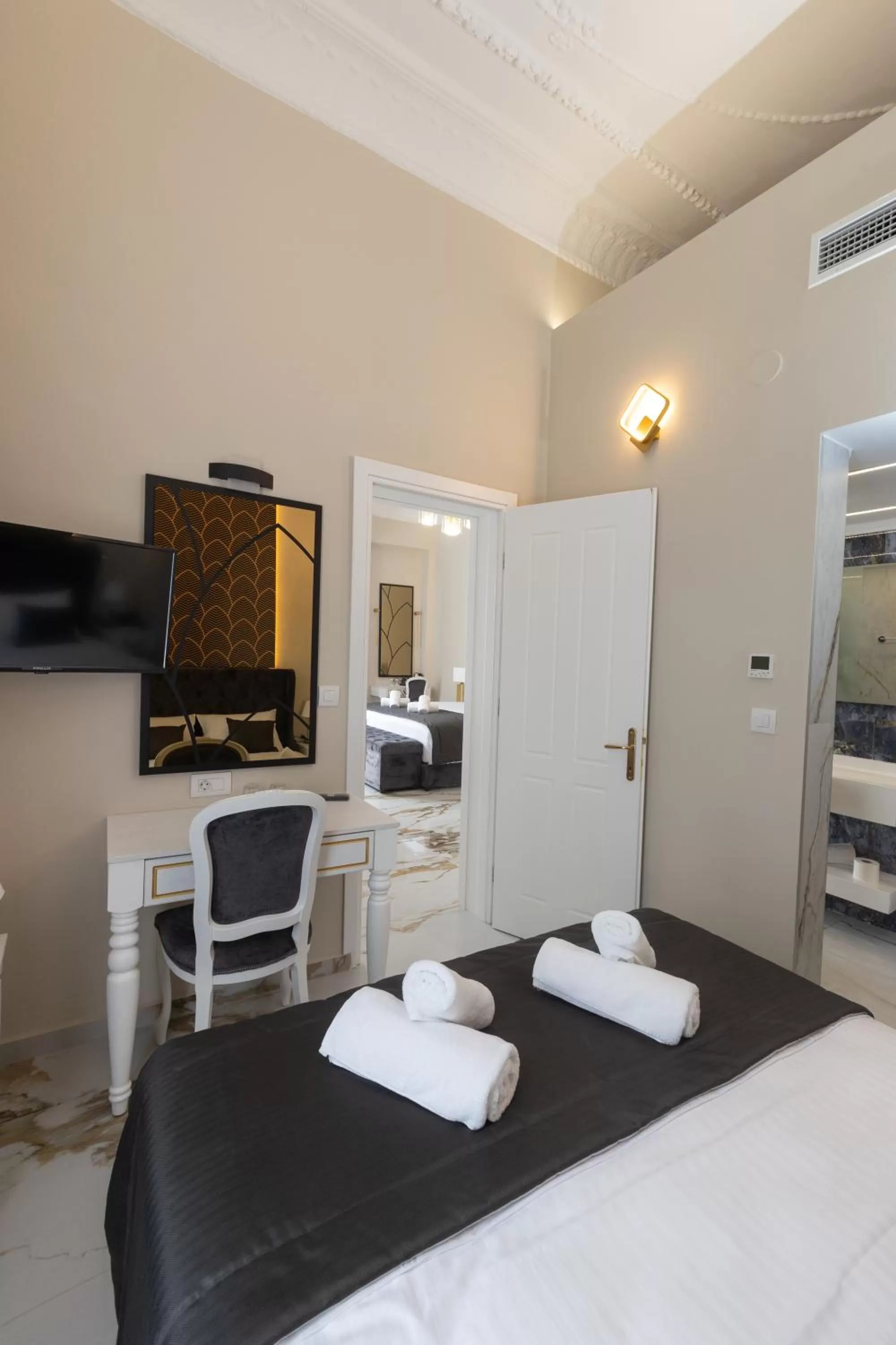 Bed in Modern Revival Luxury Hotel