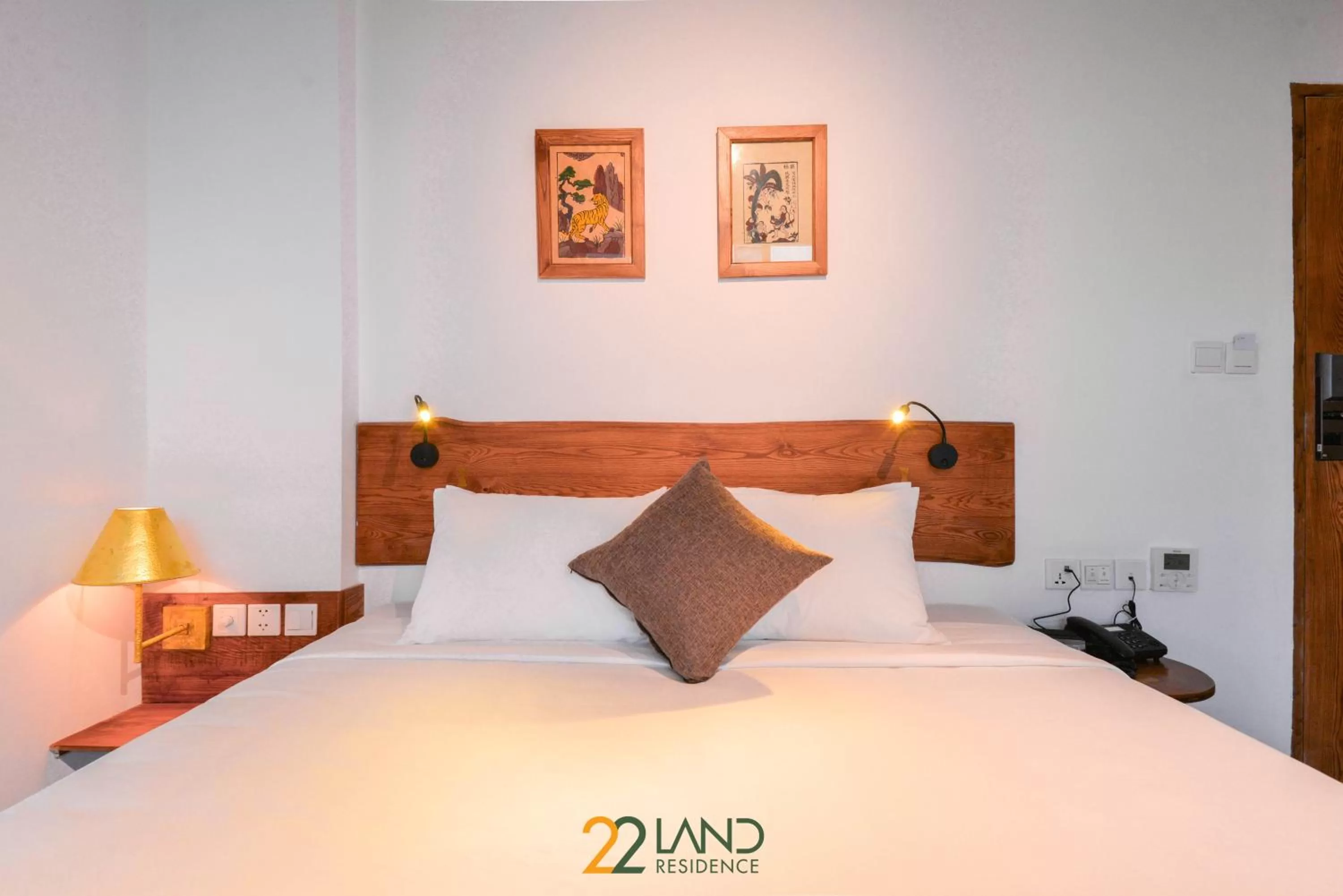 Bed in 22Land Hotel & Residence