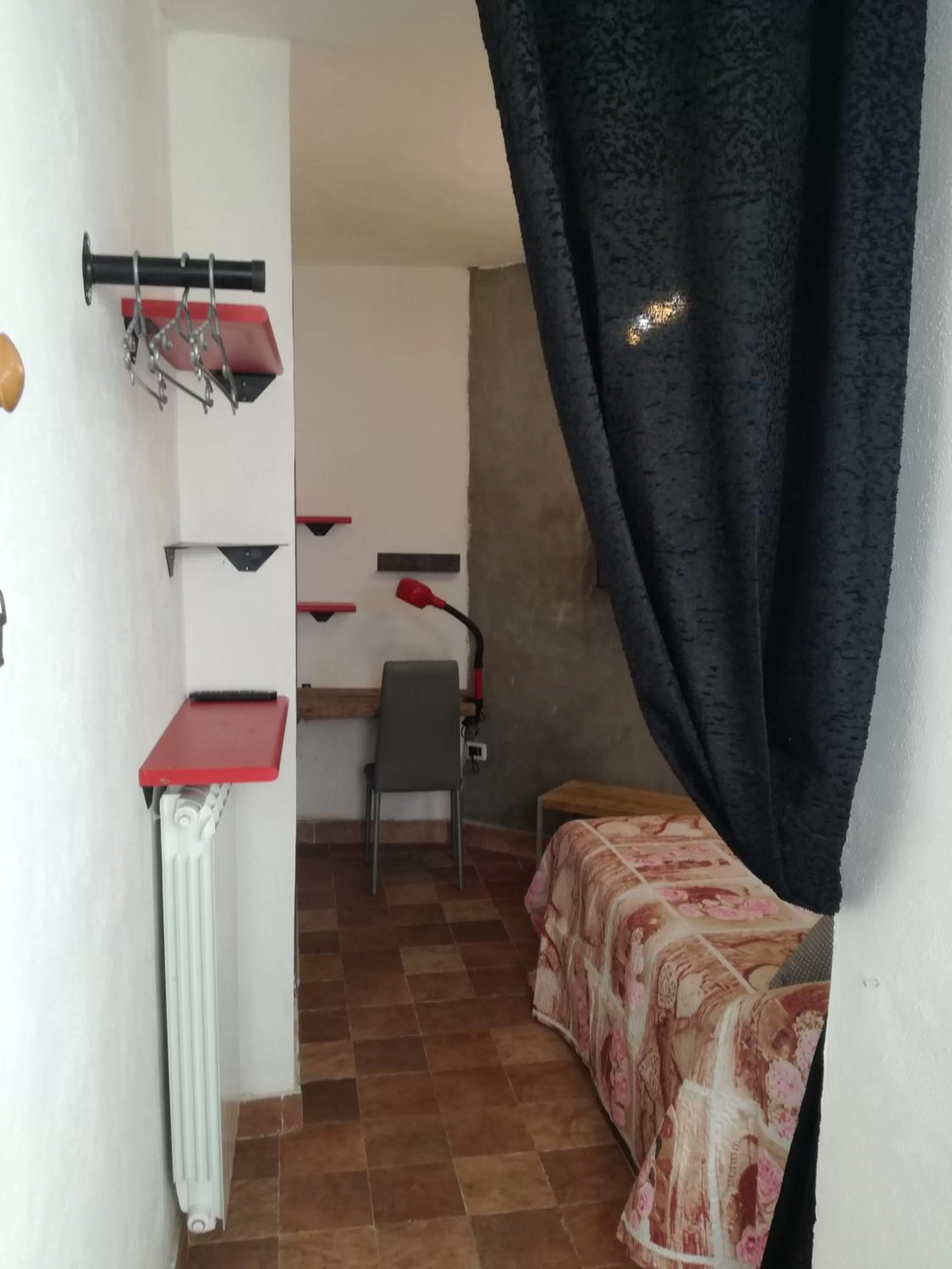 Bed in B&B PompeiLog