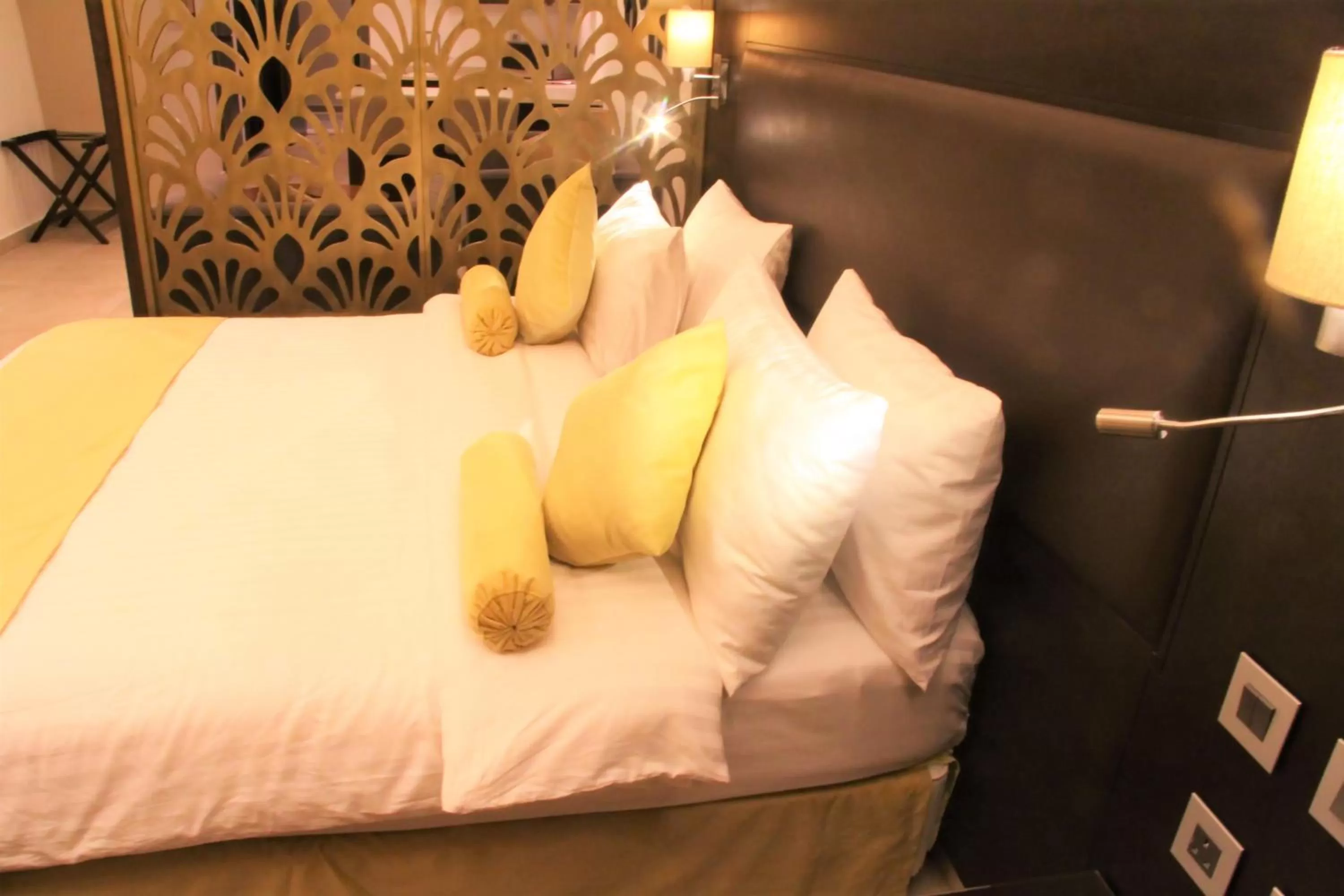 Bed in Downtown Hotel Apartments