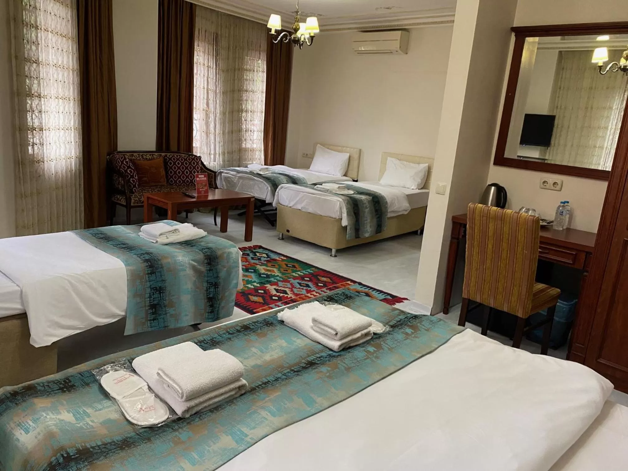 Photo of the whole room, Bed in Atam Suites