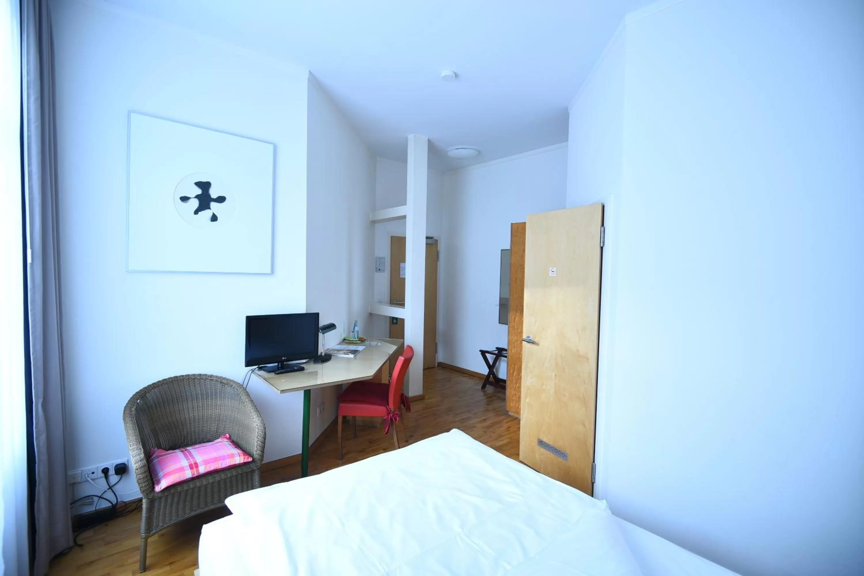 Bed in Art-Hotel Robert Mayer