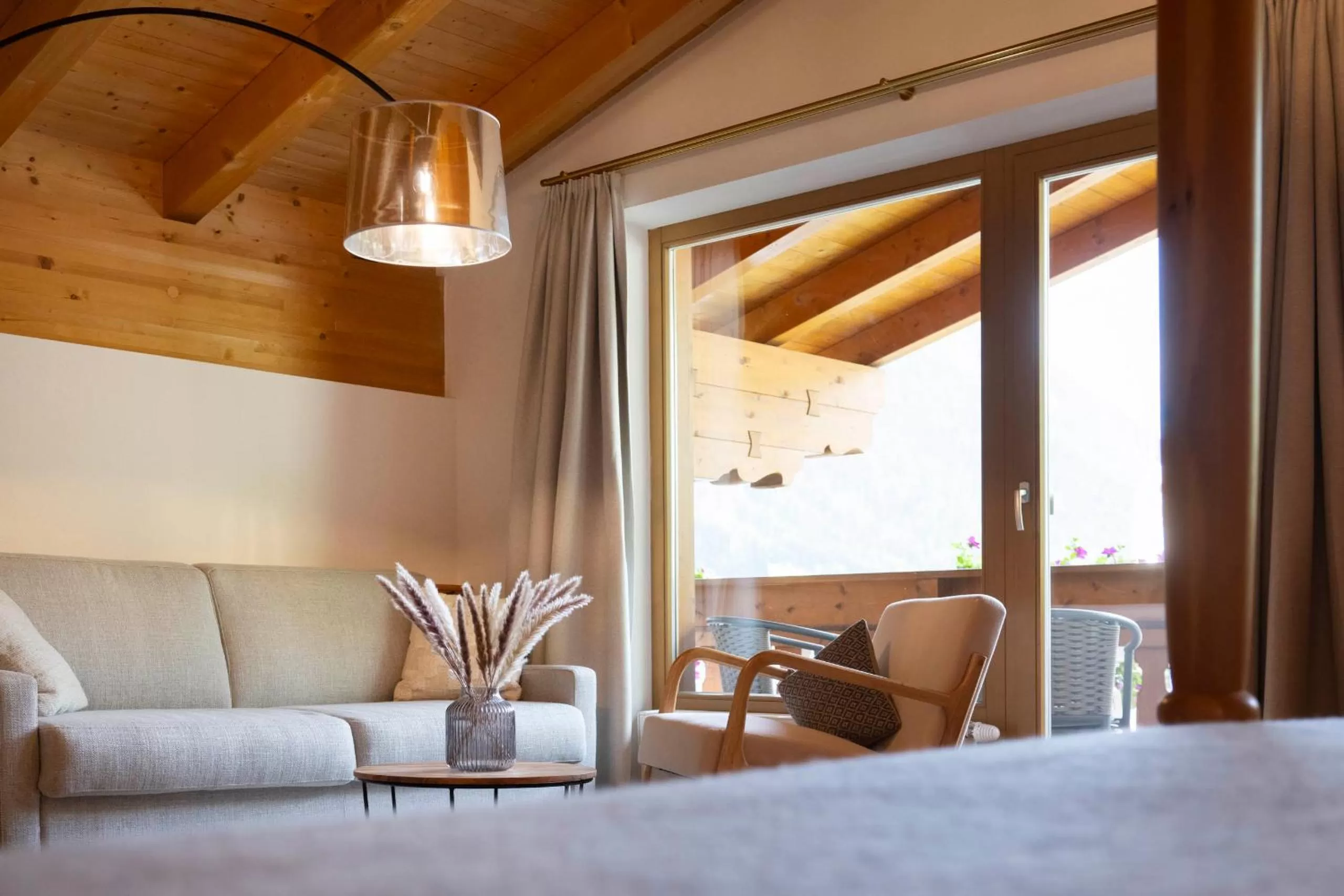 Seating area, Bed in Hotel Stubaierhof