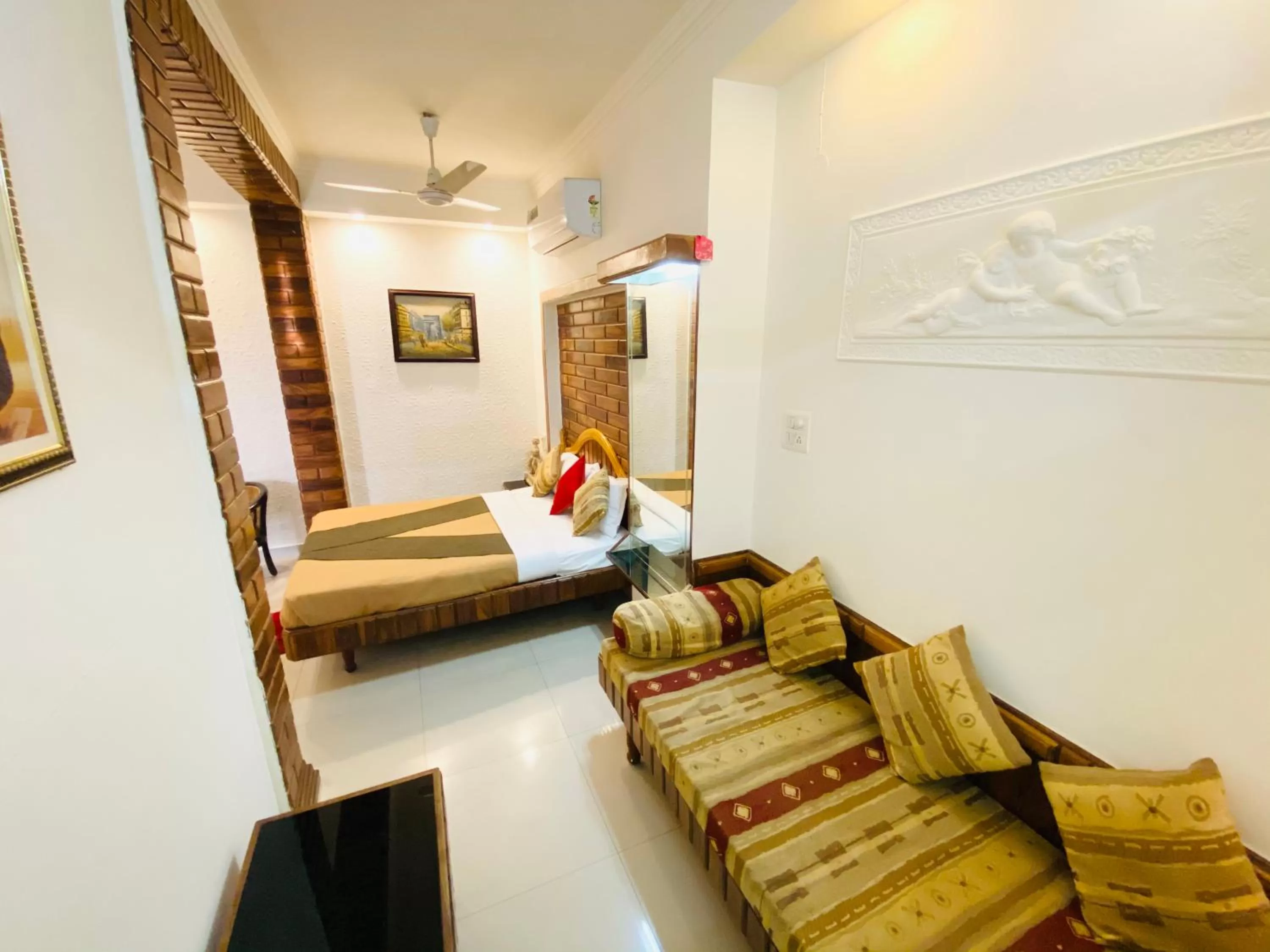 Seating area, Bed in Hotel The Galaxy