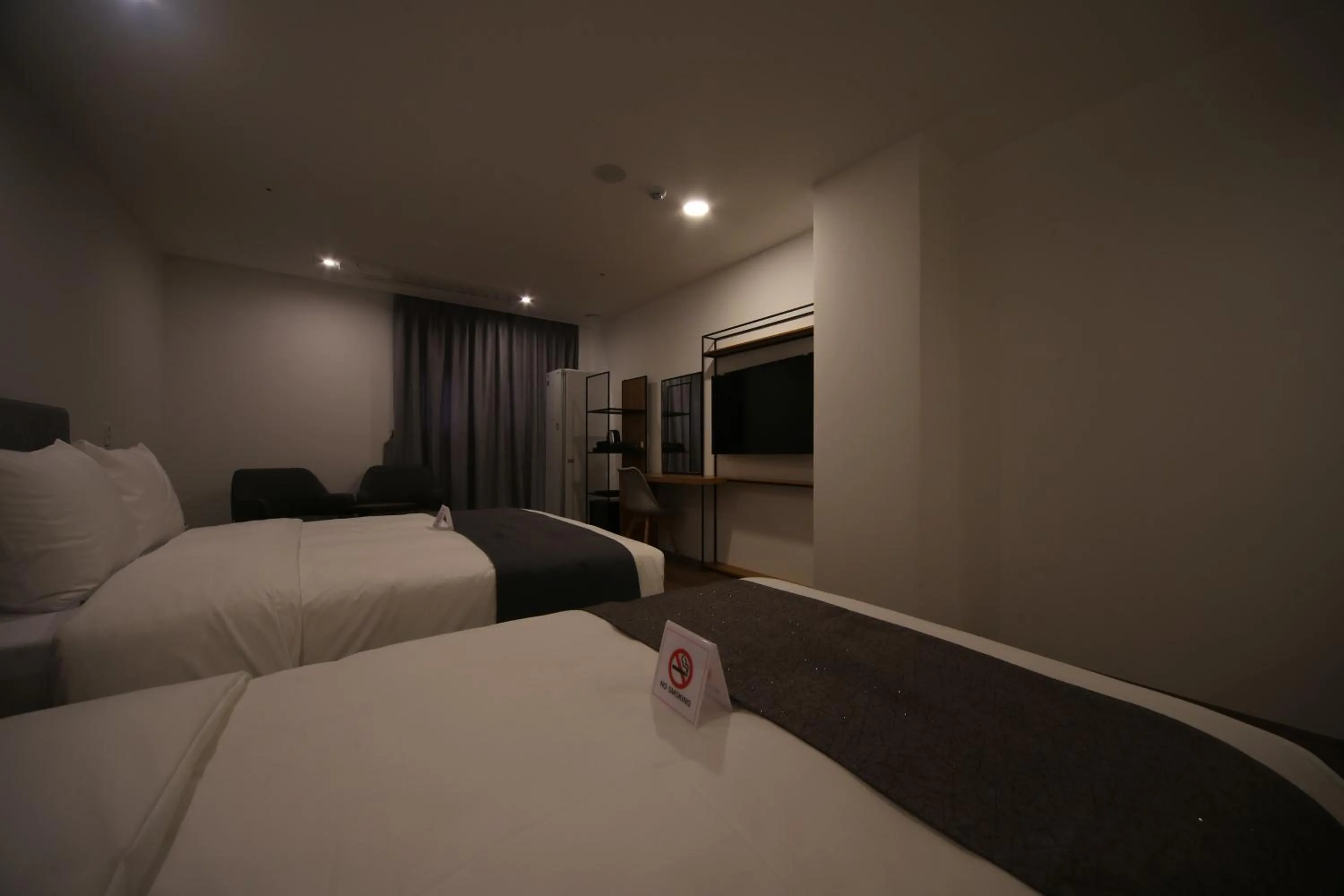 Bed in Hotel Noblestay