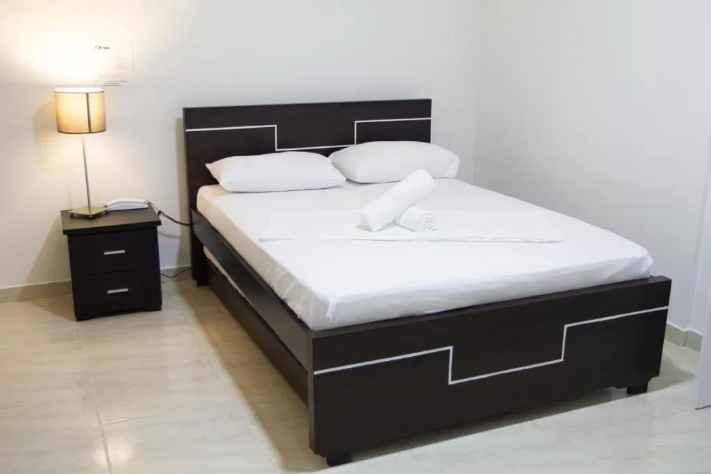 Bed in Hotel Residencias la CH