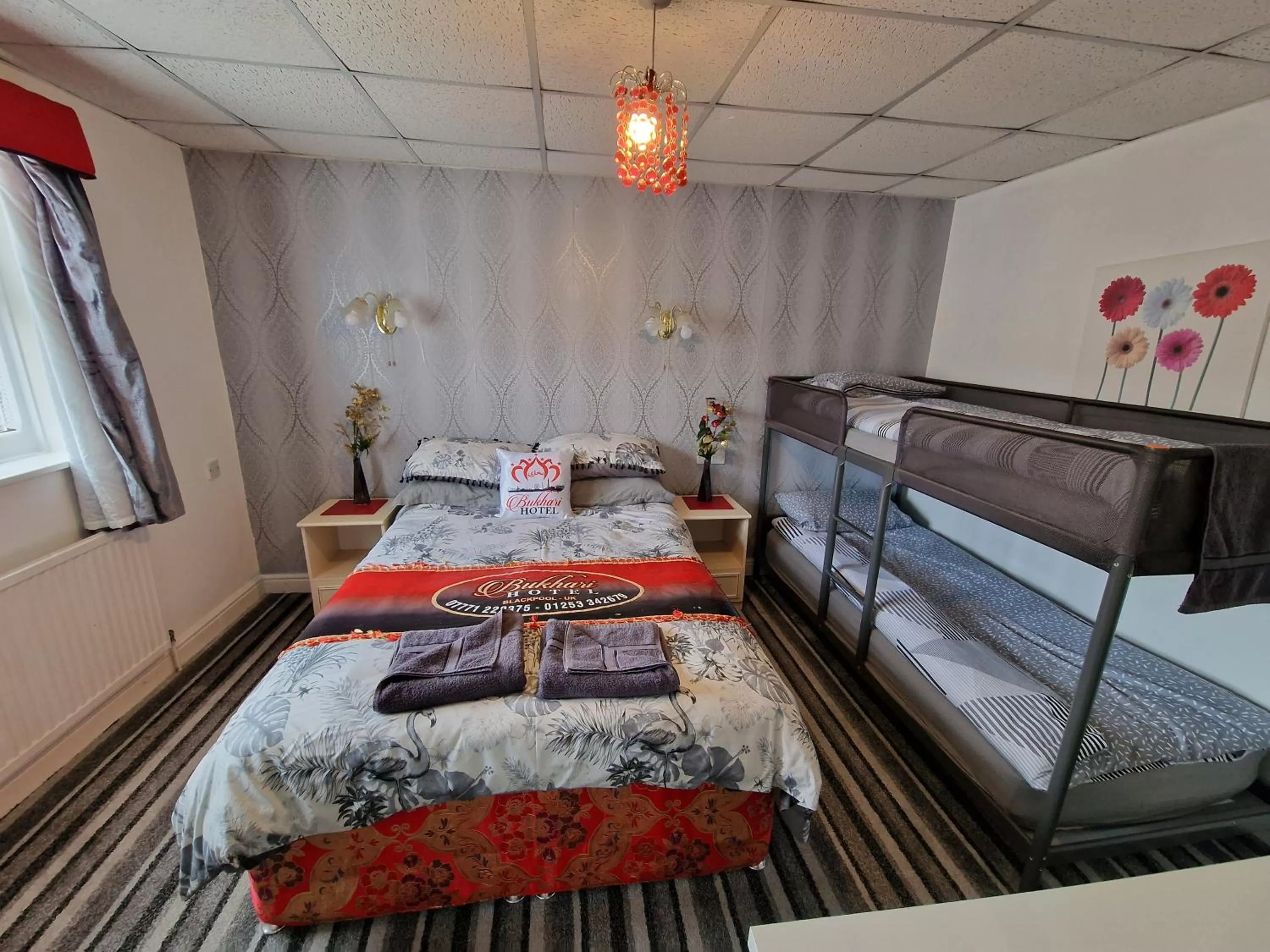 Bed in BUKHARI Hotel