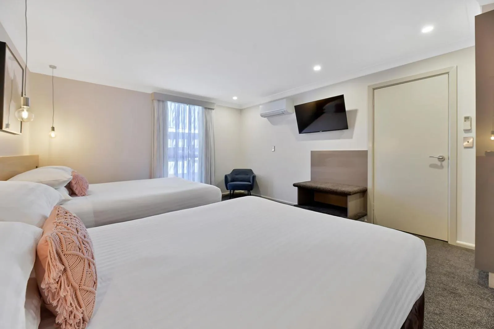 Bed in Central Caleula Motor Lodge