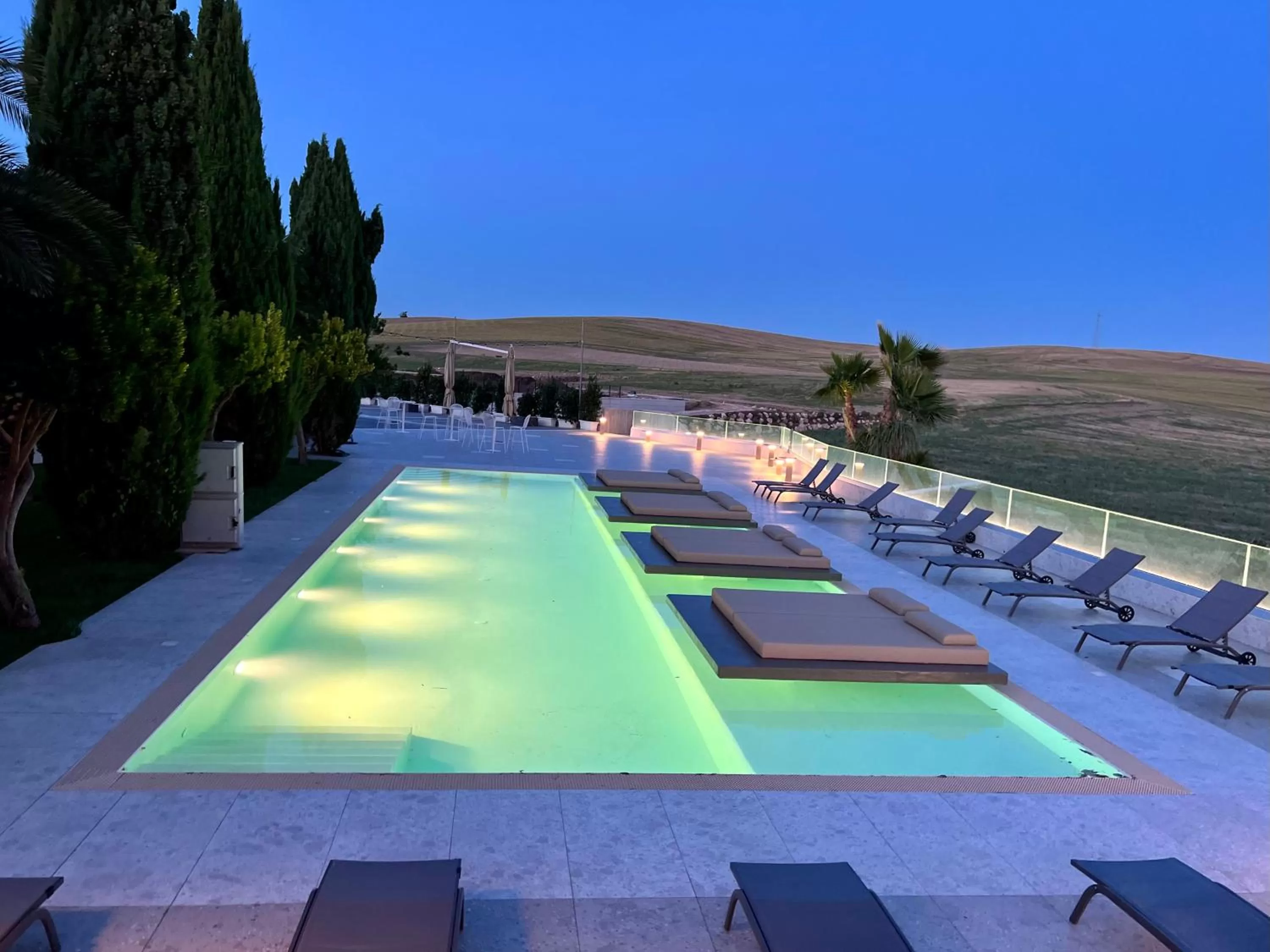 Swimming pool in UNA HOTELS MH Matera