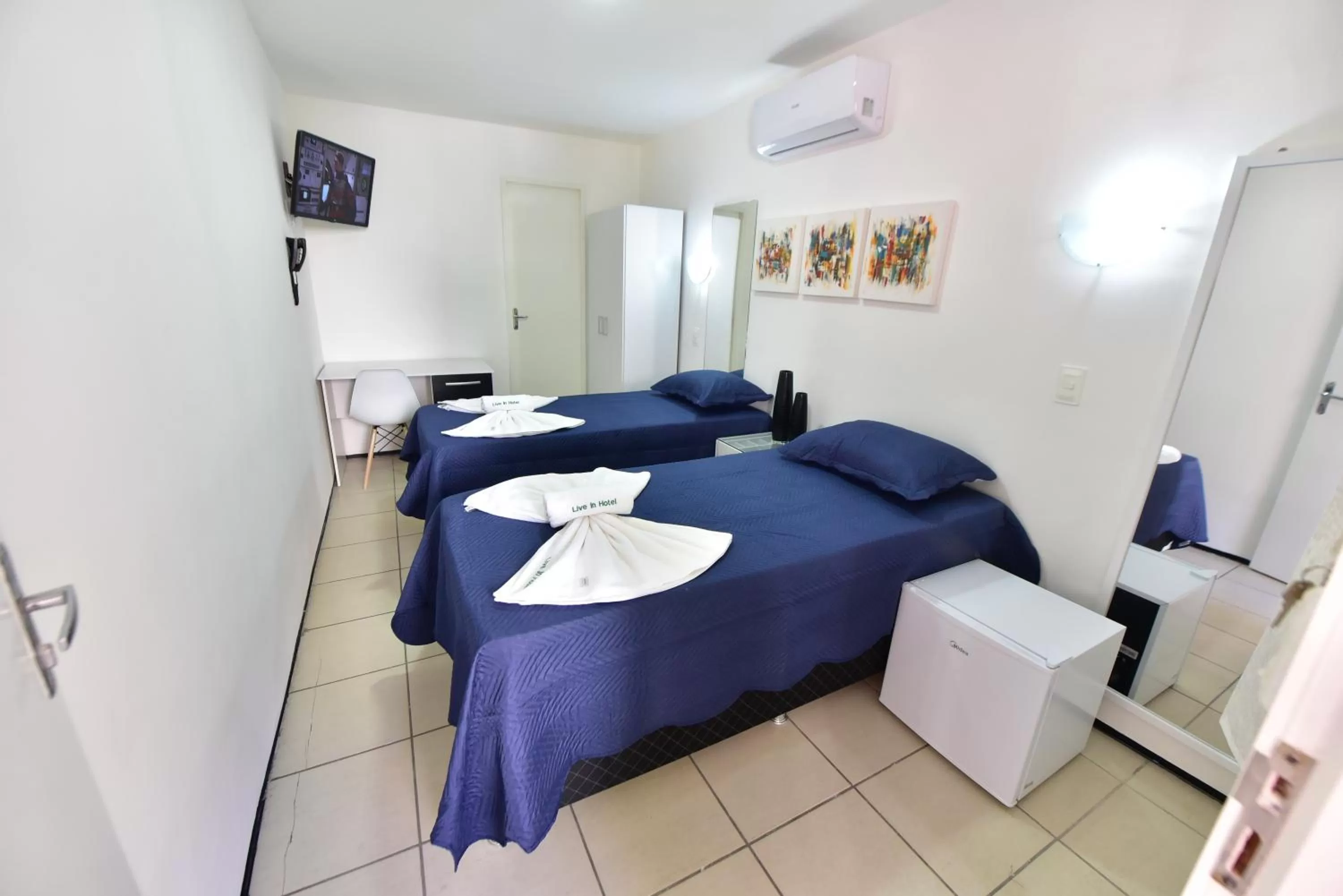 Bed in LIVE IN FORTALEZA HOTEL