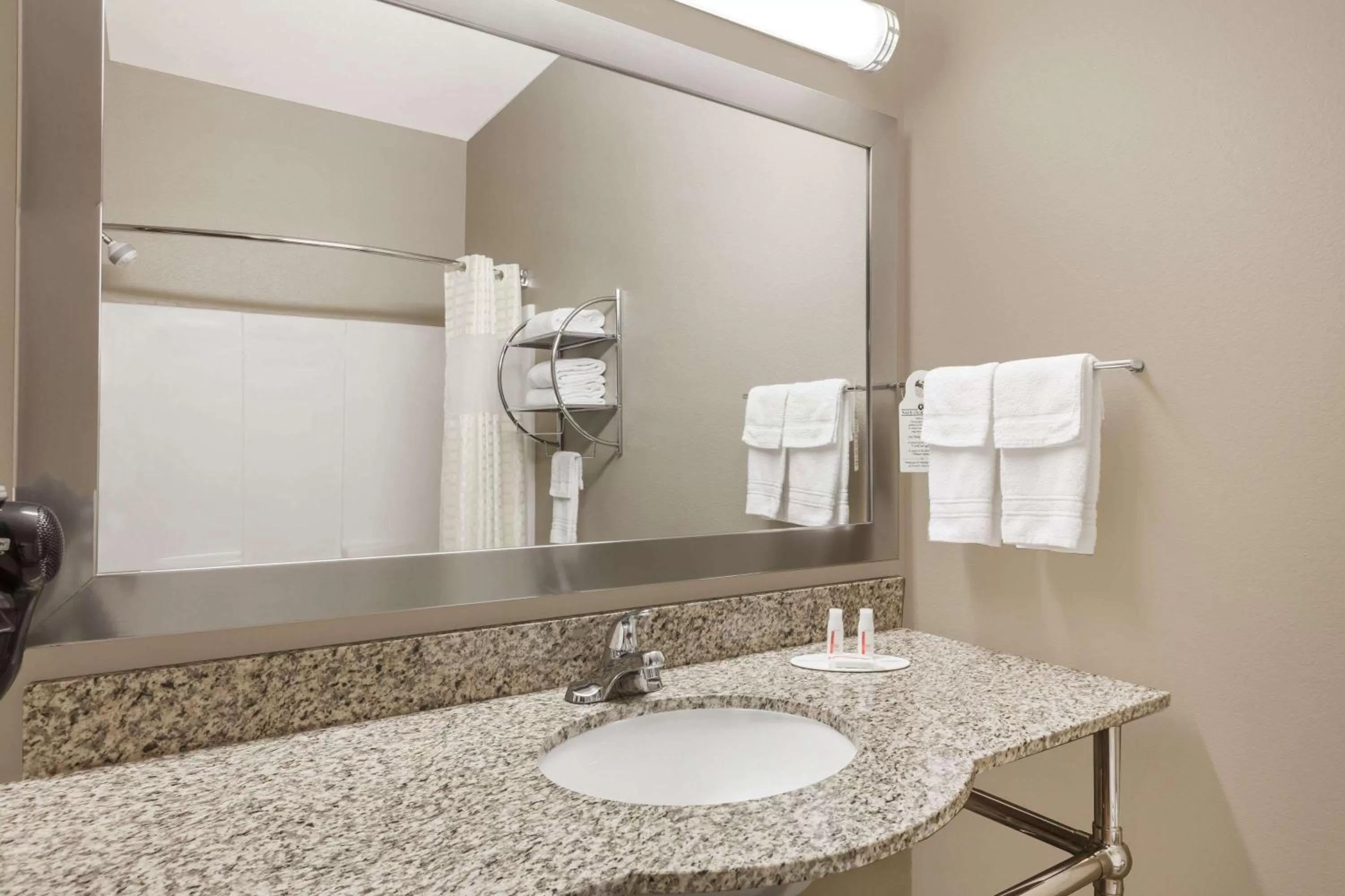 Bathroom in Days Inn & Suites by Wyndham Marquez