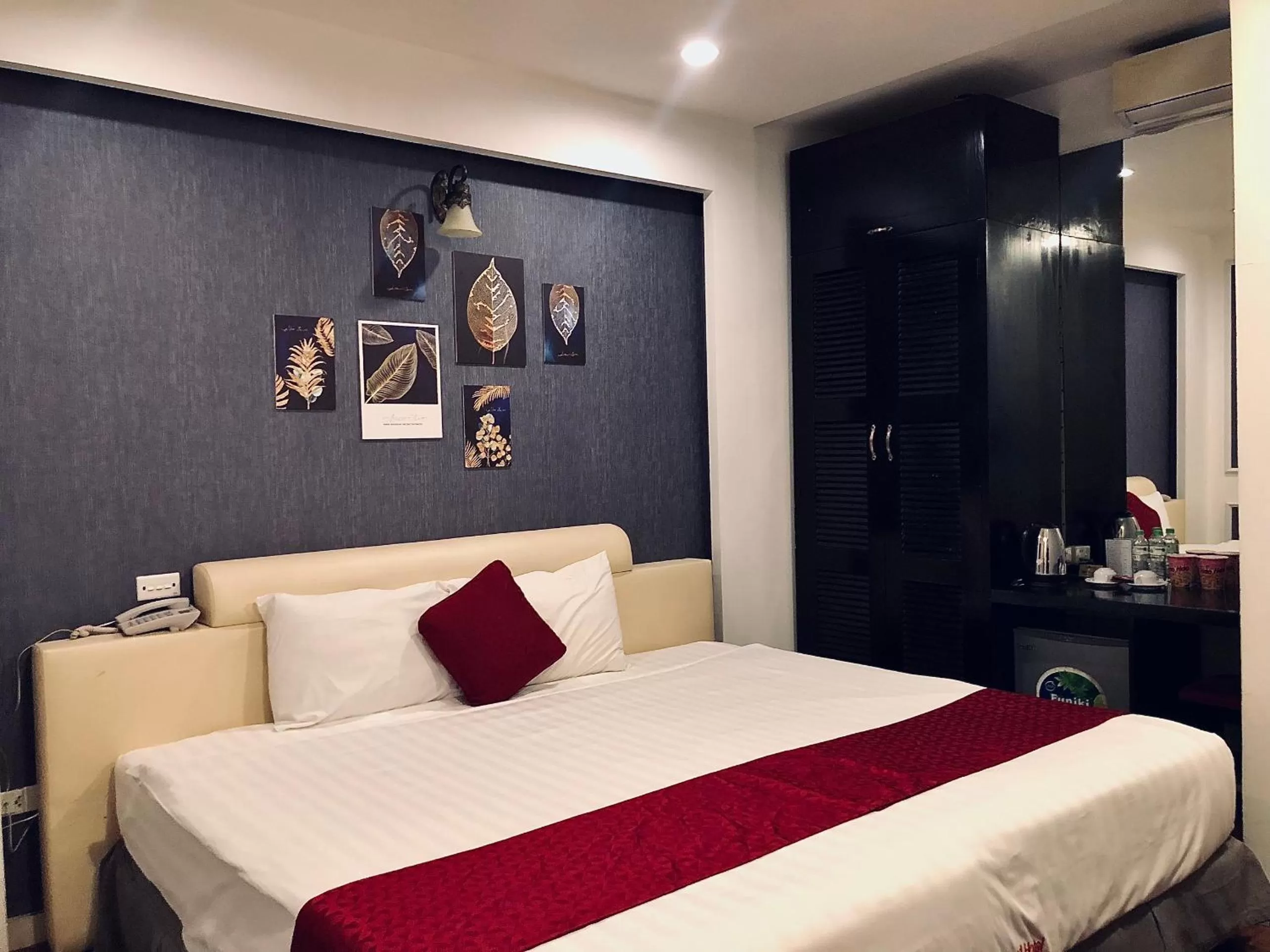 Bed in Eclipse Legend Hotel