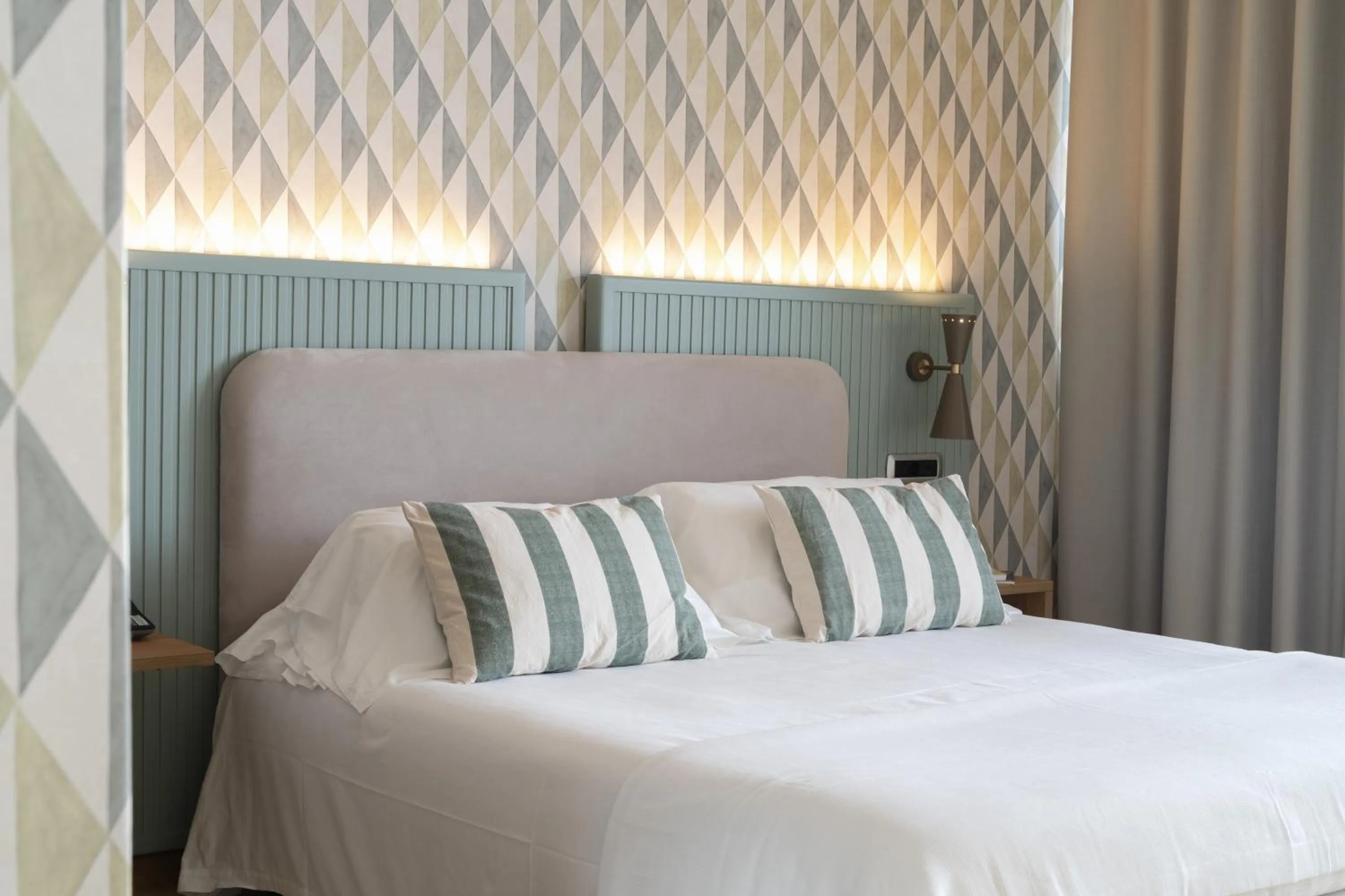 Bed in Reginna Palace Hotel