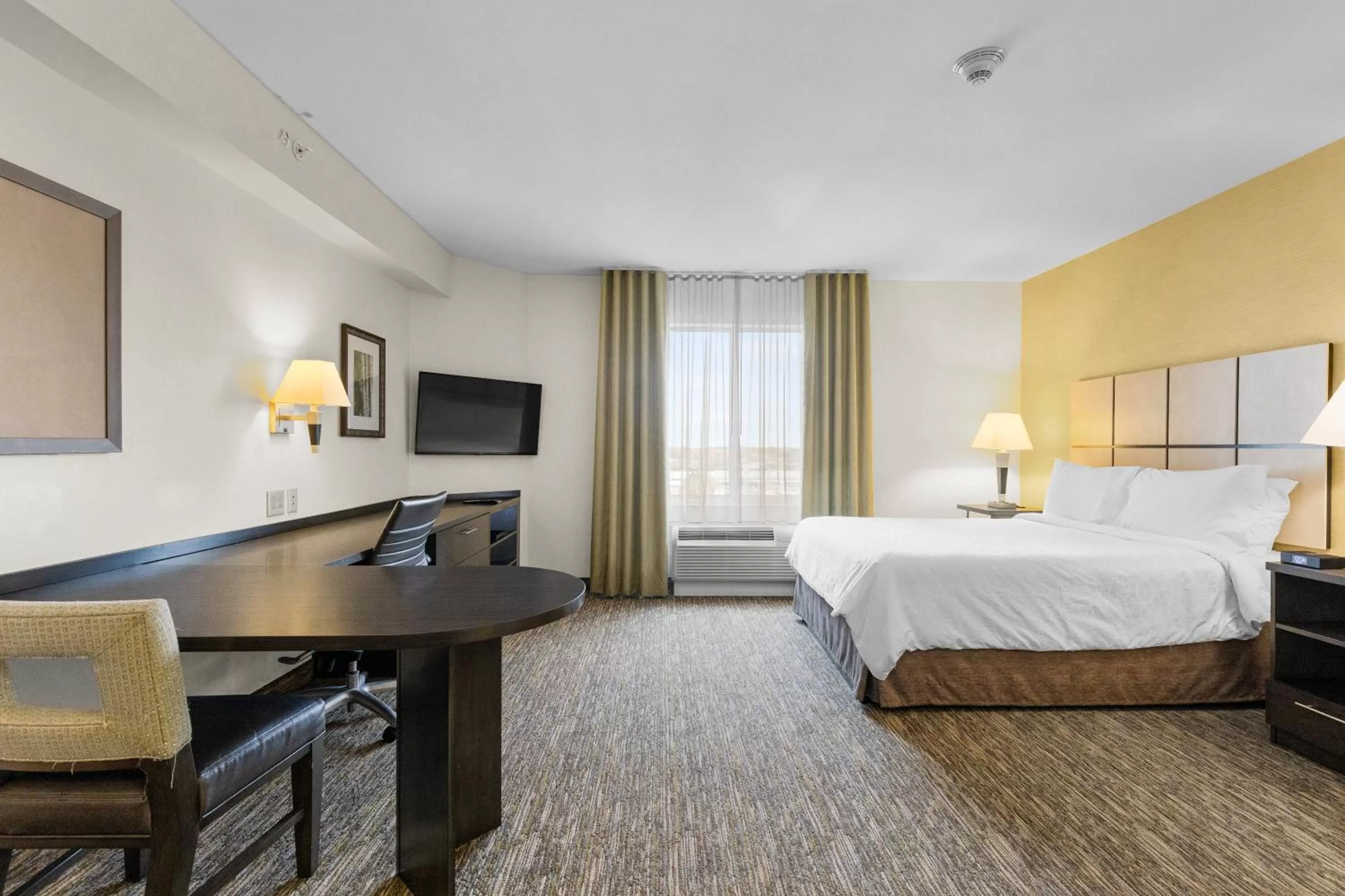 Bed in Candlewood Suites Erie by IHG