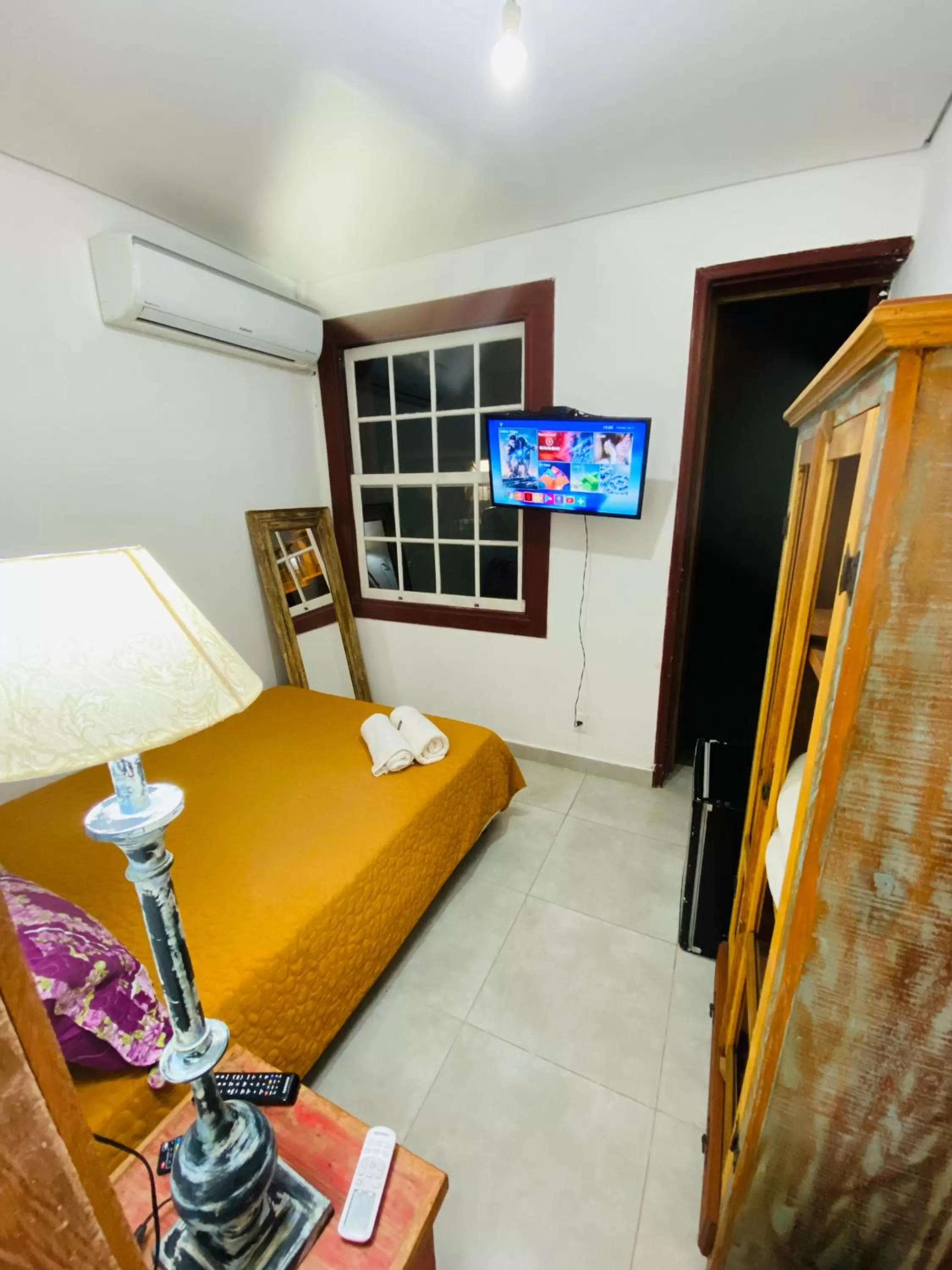 Bed in POUSADA CHARLOTTE