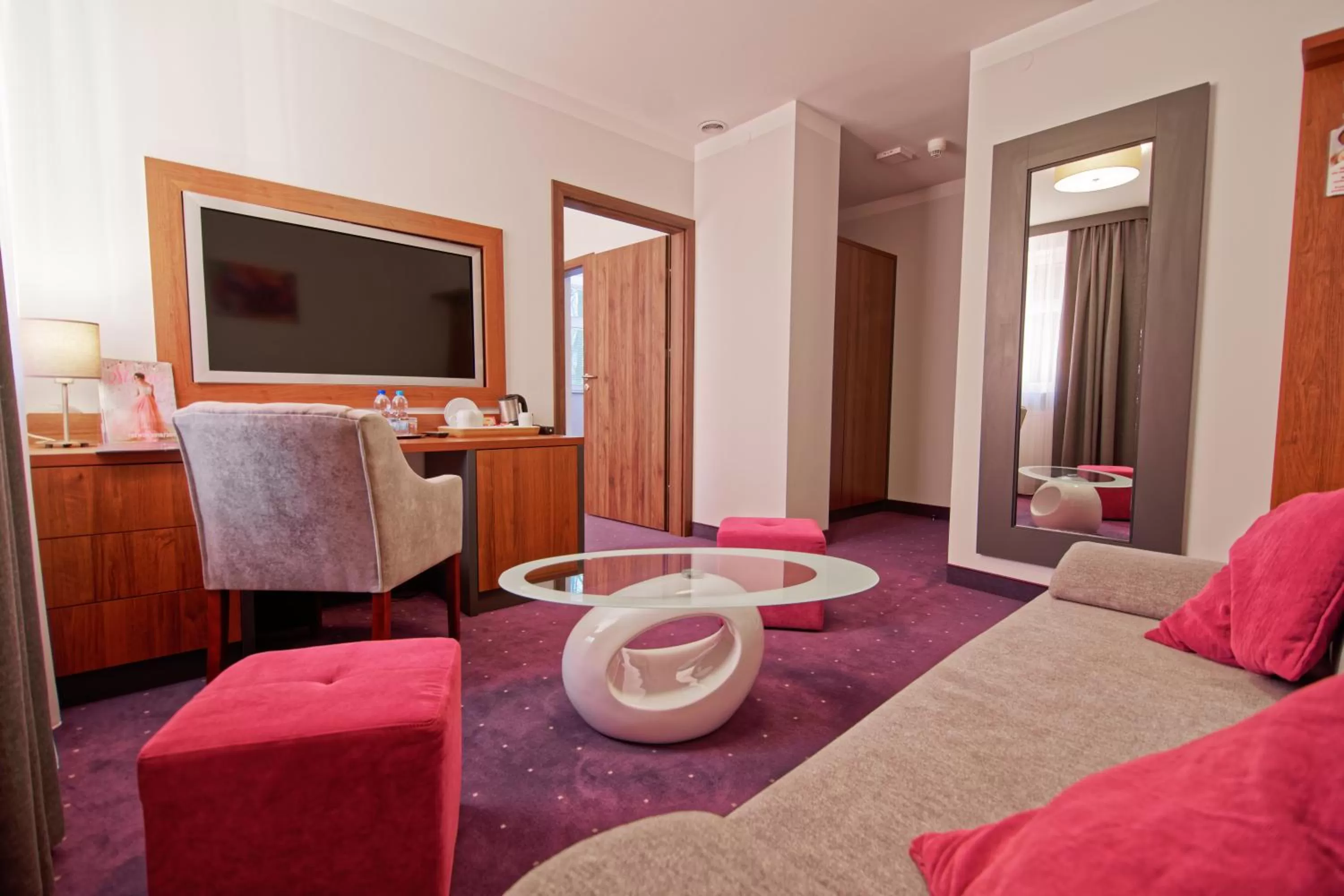 Communal lounge/ TV room, Bed in Best Western Plus Hotel Olsztyn Old Town