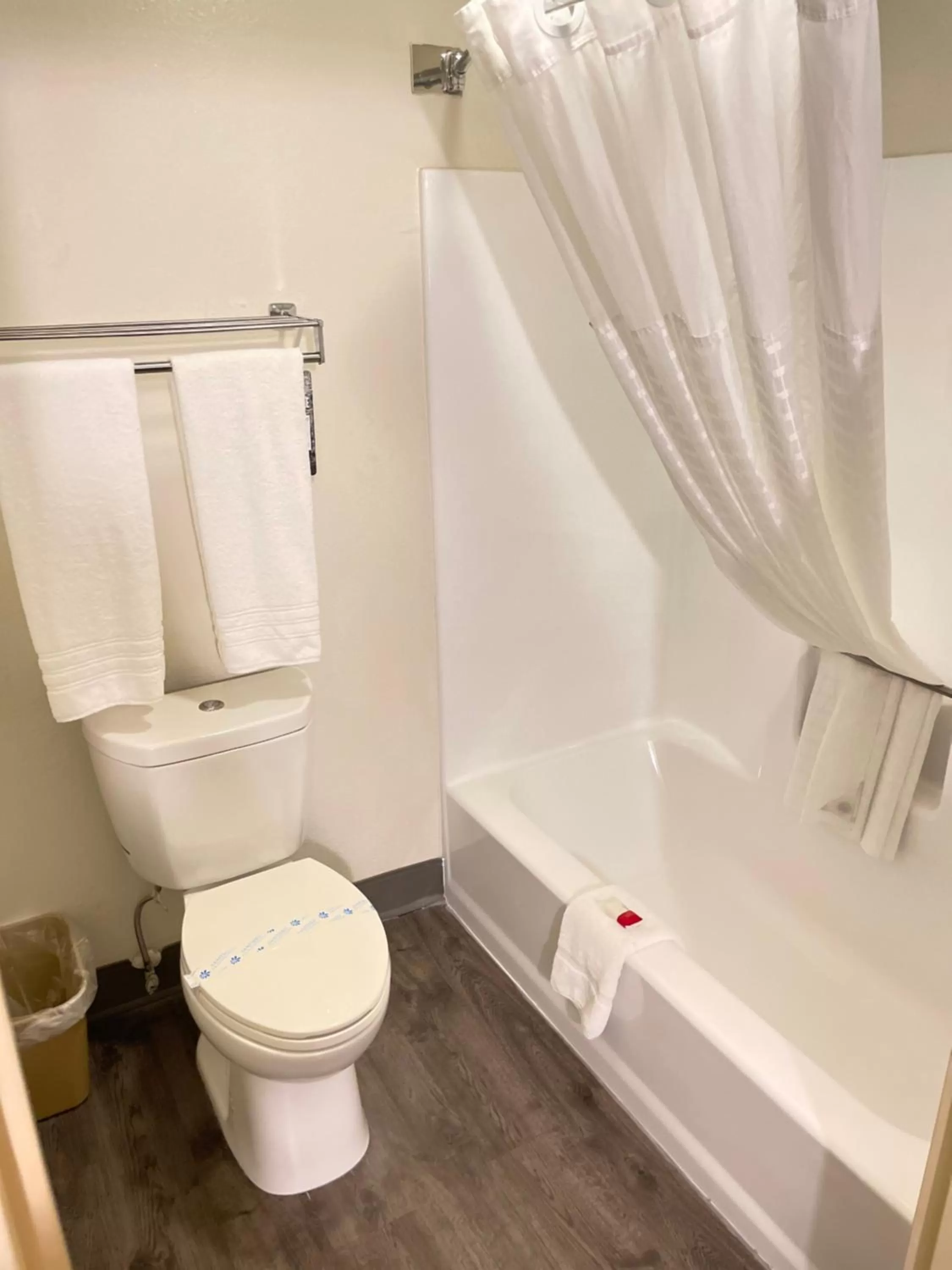 Toilet in Super 8 by Wyndham Fort Worth Downtown South