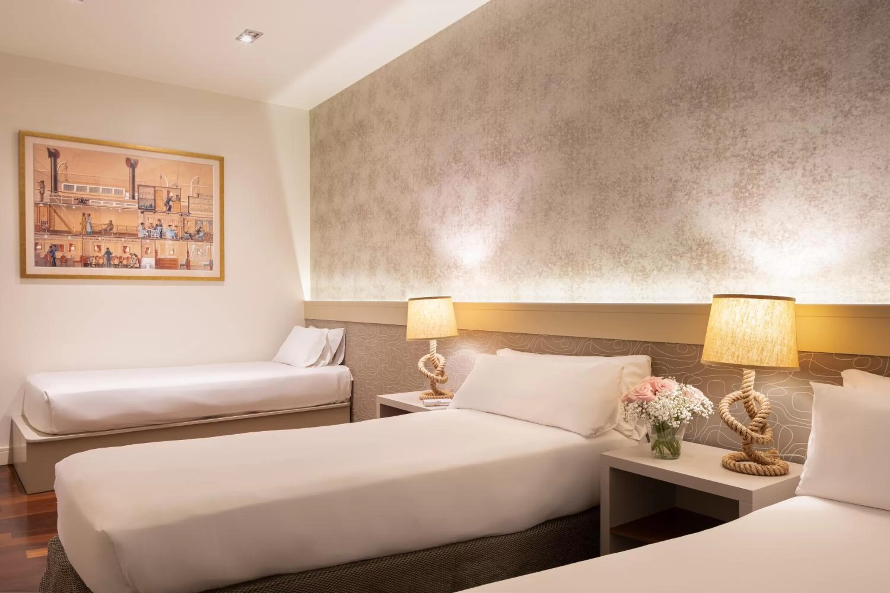 Photo of the whole room, Bed in Duquesa Suites Landmark Hotel by Grup Duquessa