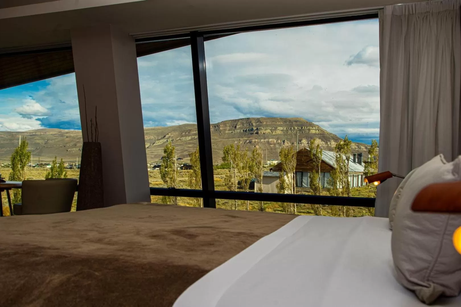Day, Bed in Design Suites Calafate