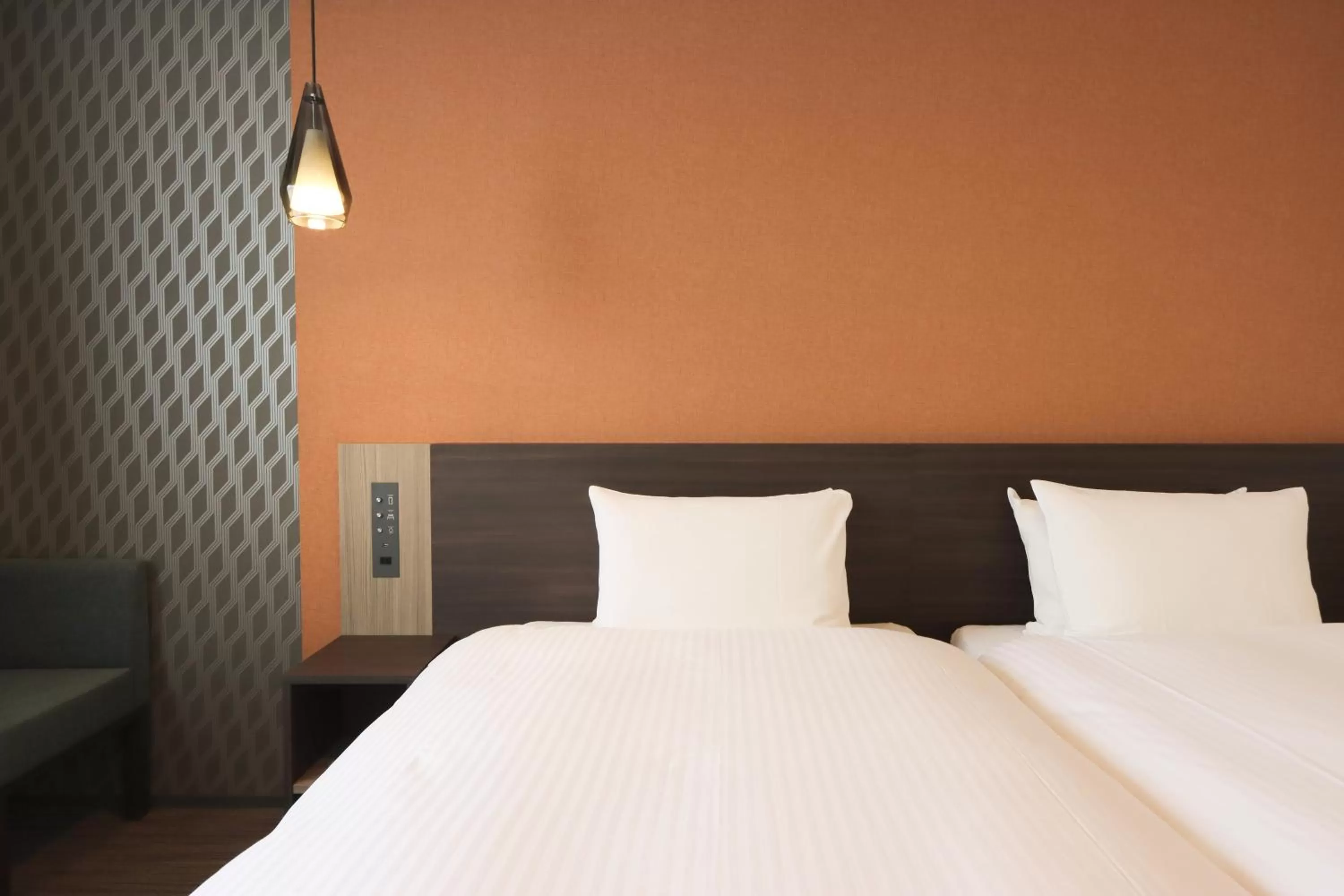 Bed in Wander Kyoto Nanajo