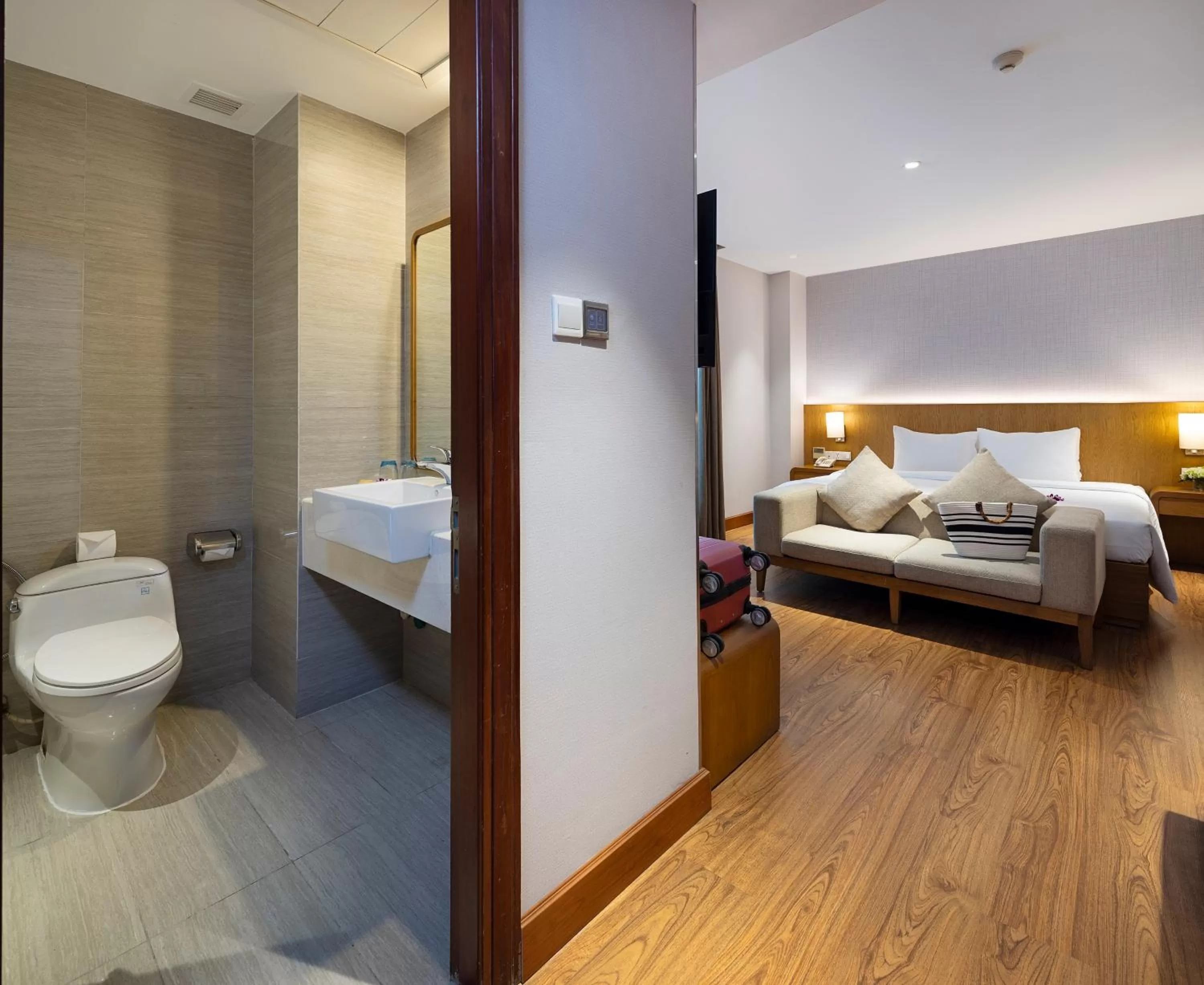 Toilet, Bed in Harmony Saigon Hotel & Spa