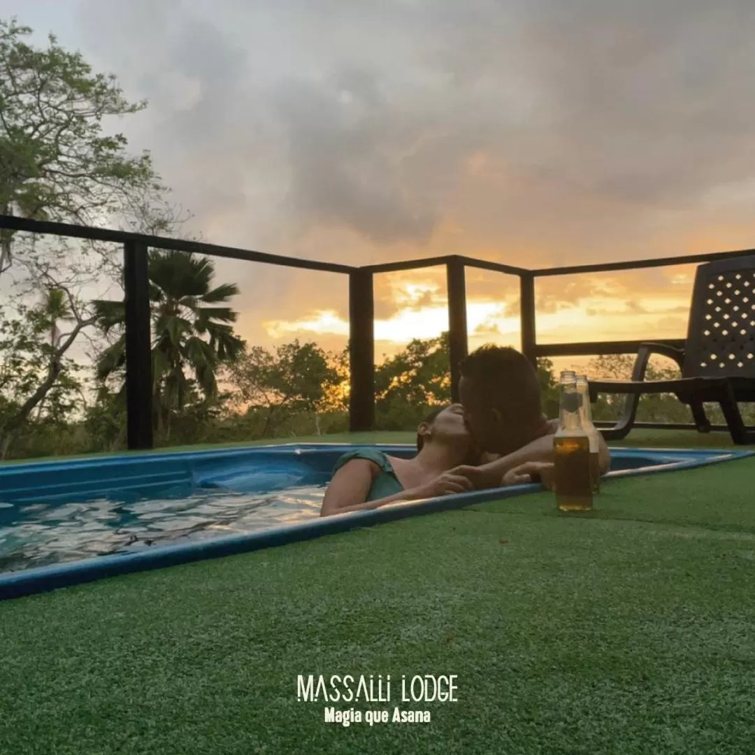 Sunset, Swimming Pool in Massalli Sanctuary Lodge