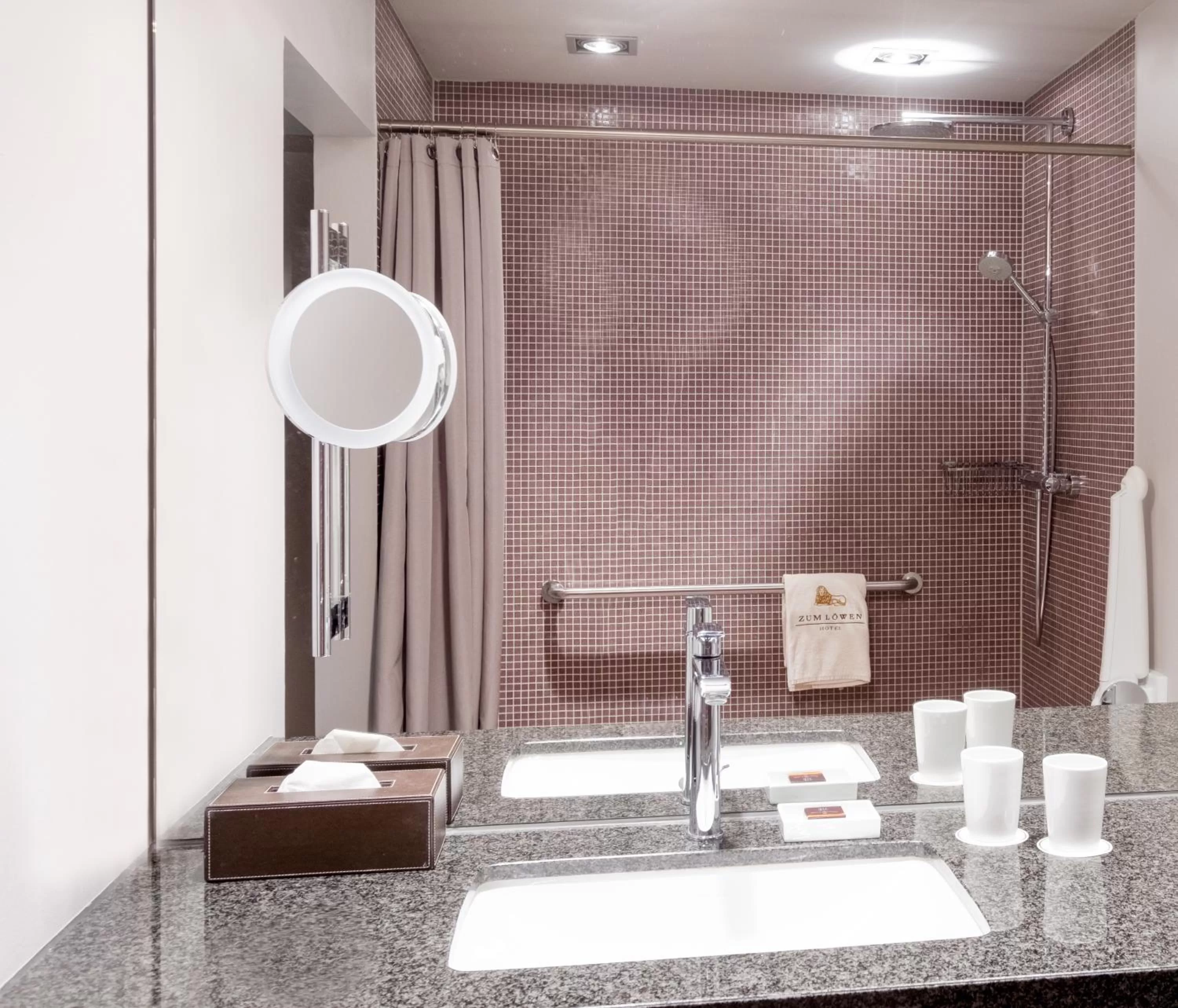 Shower in Zum Löwen Design Hotel Resort & Spa