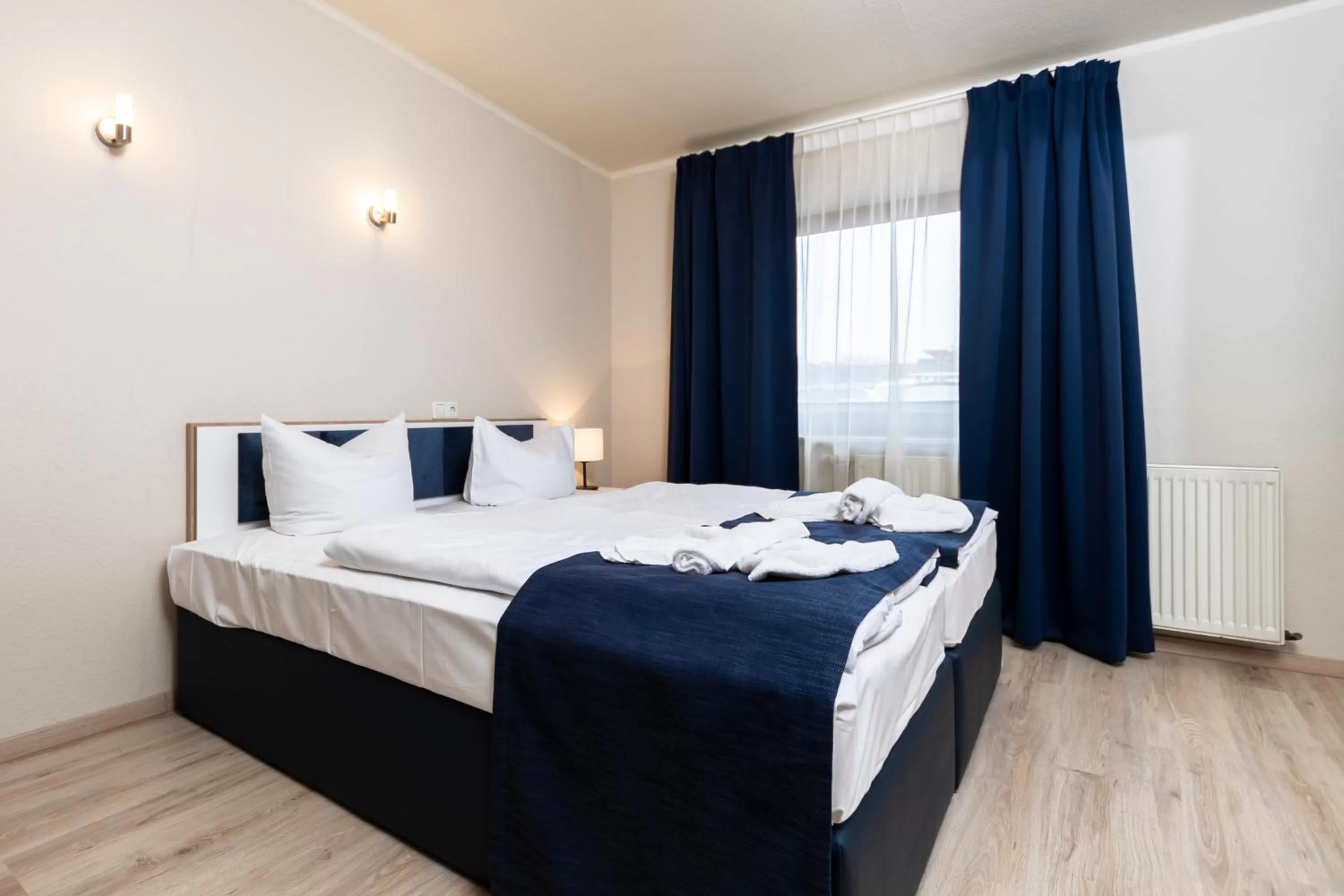 Bed in Aparthotel Stralsund Studios und Apartments