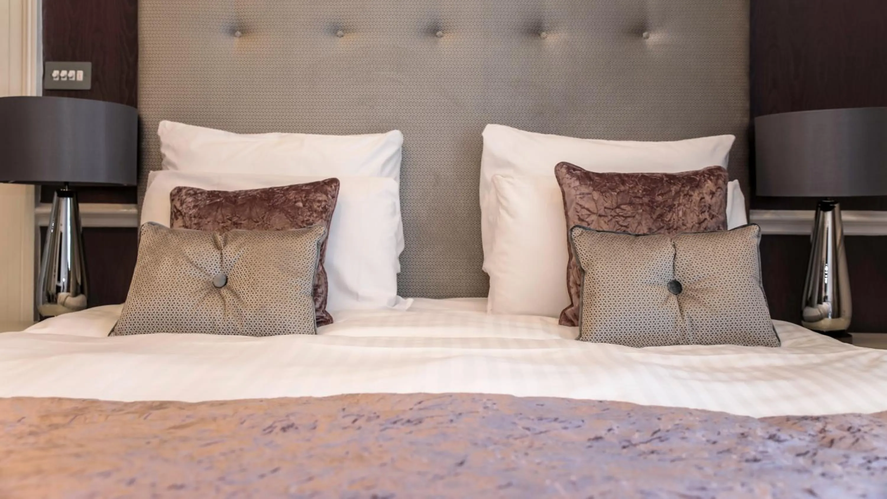 Decorative detail, Bed in Queens Court Hotel