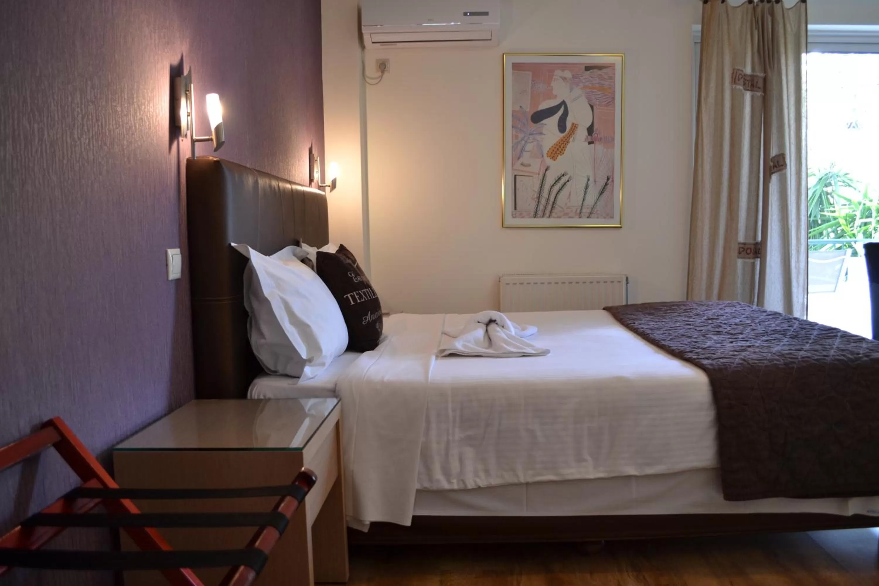 Bed in Rivitel Marousi Apartments