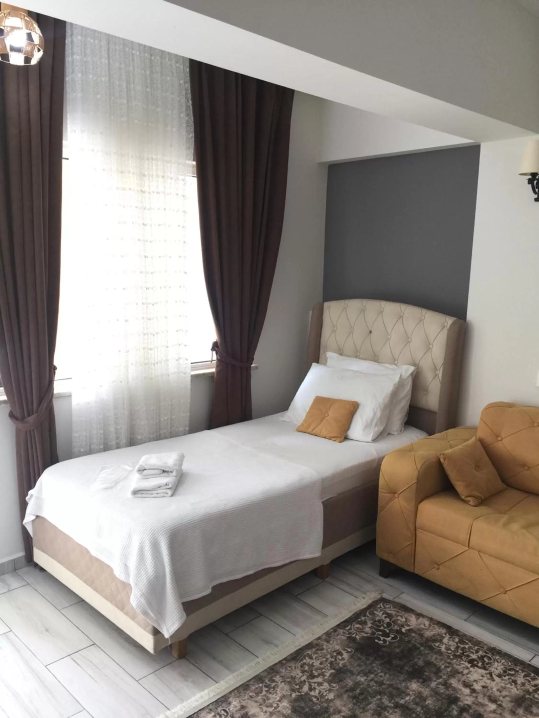 Bed in GÜNEŞ APART OTEL