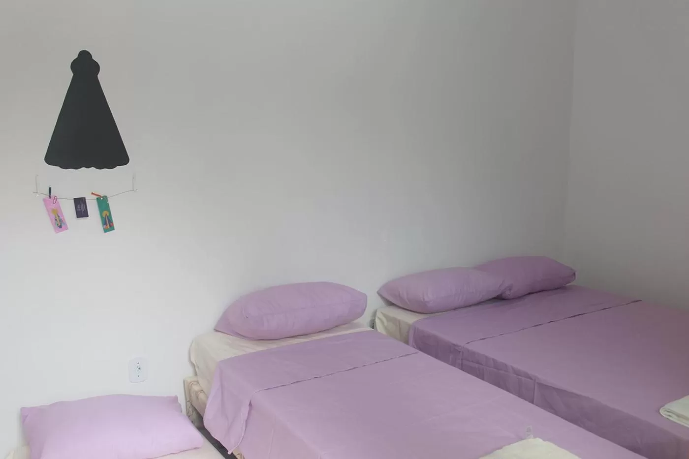 Bed in Pousada Orquideas de Maria