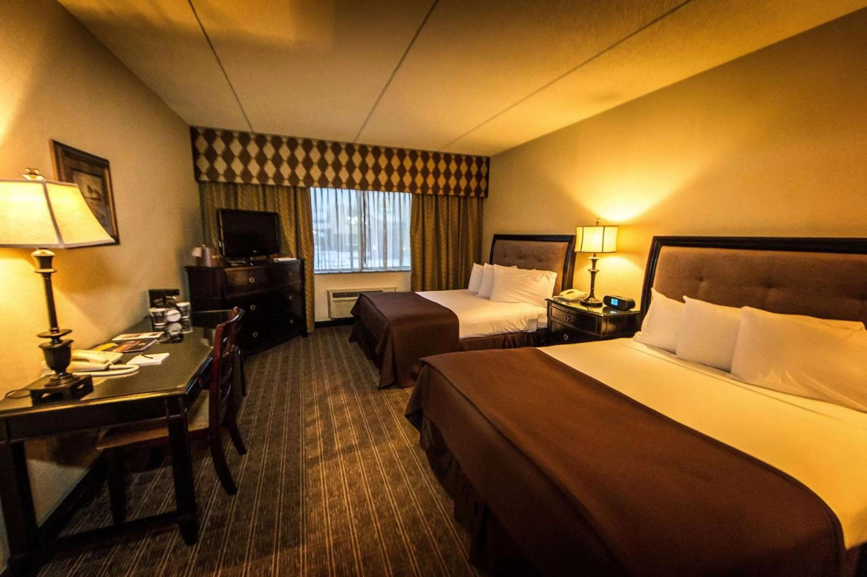 Photo of the whole room, Bed in Garden Place Hotel