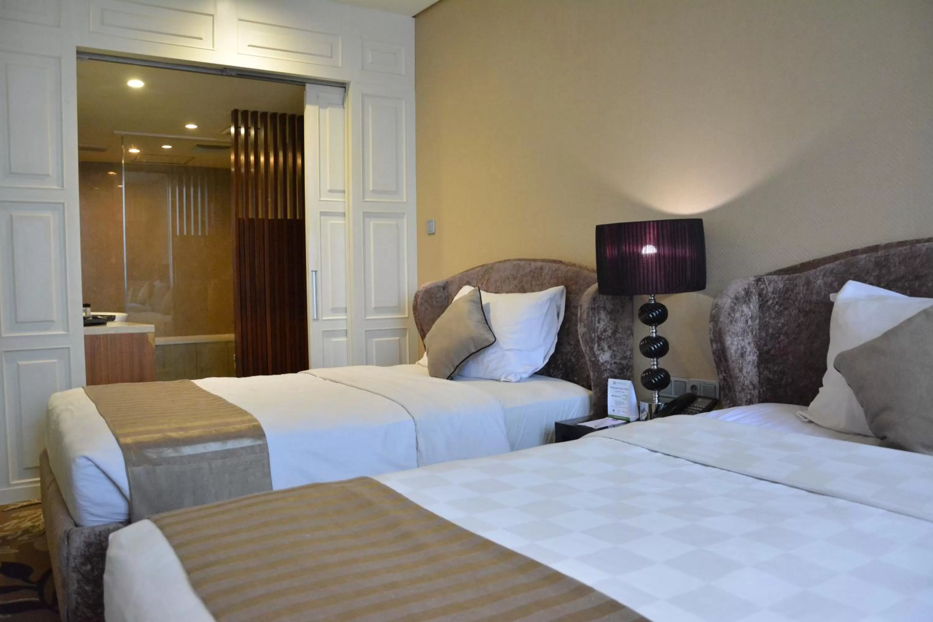 Bed in Garden Palace Hotel Powered by Archipelago