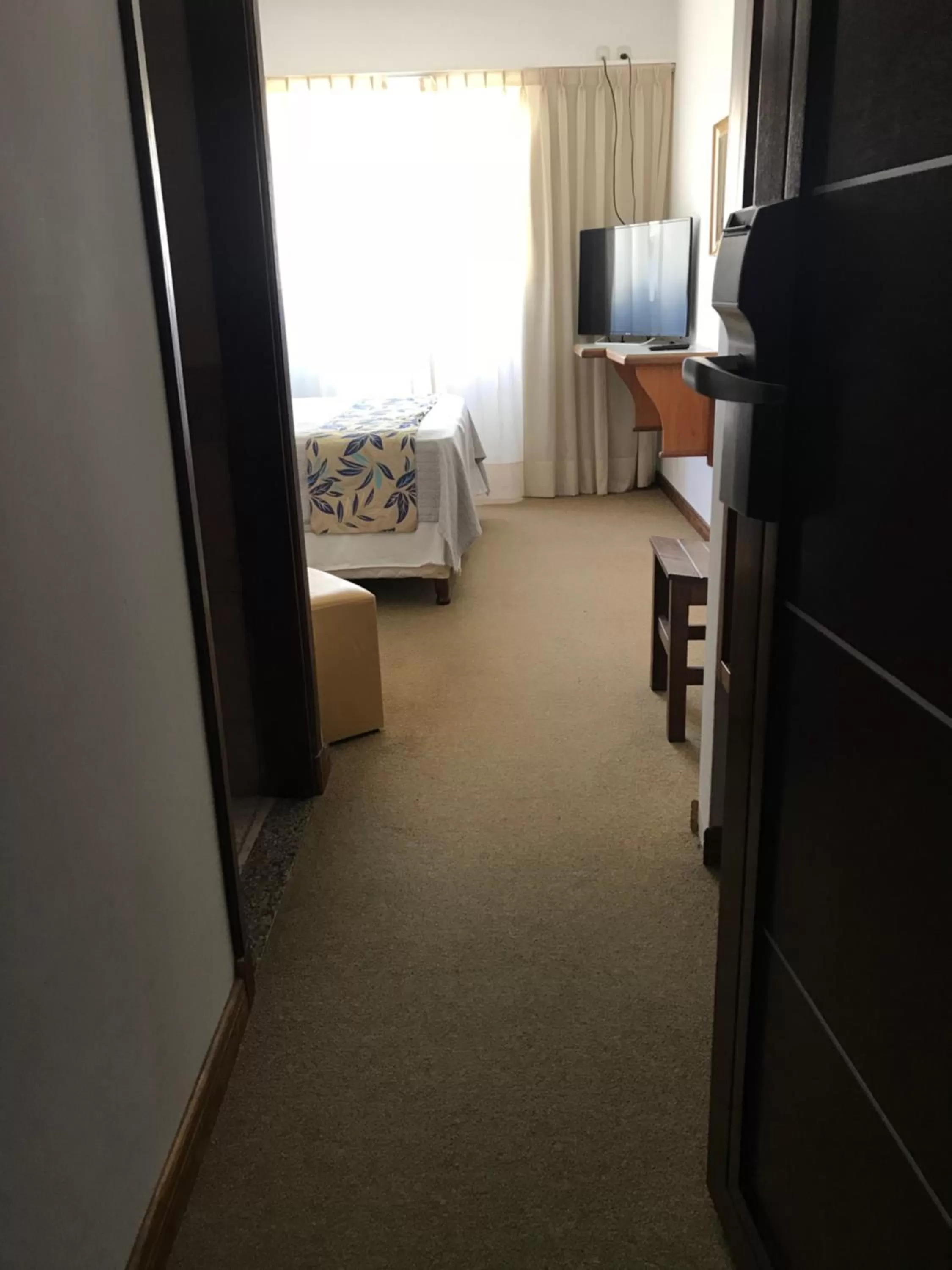 Bed in Costanera Mar Hotel & Suites