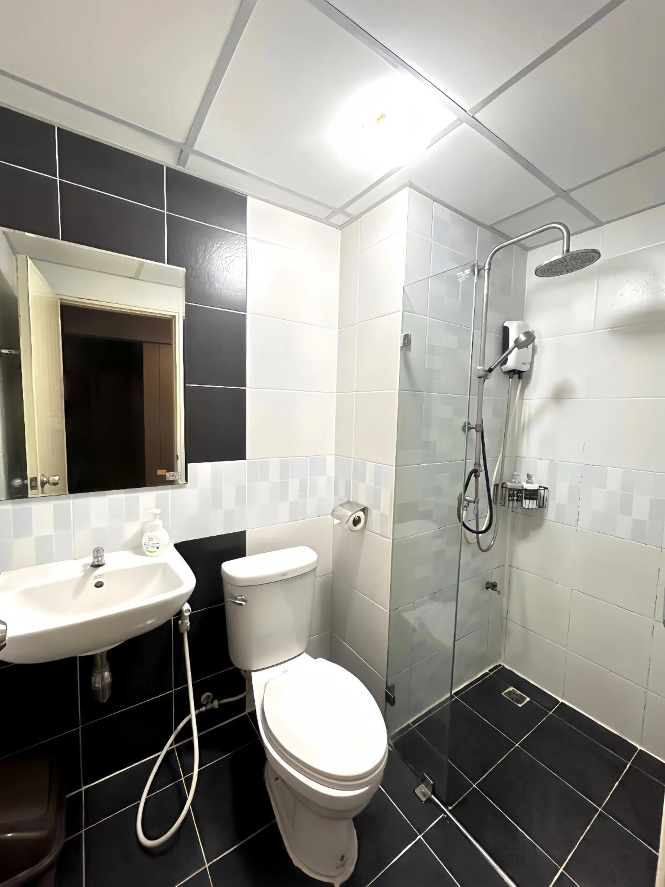 Shower in Hide Bangkok Hostel