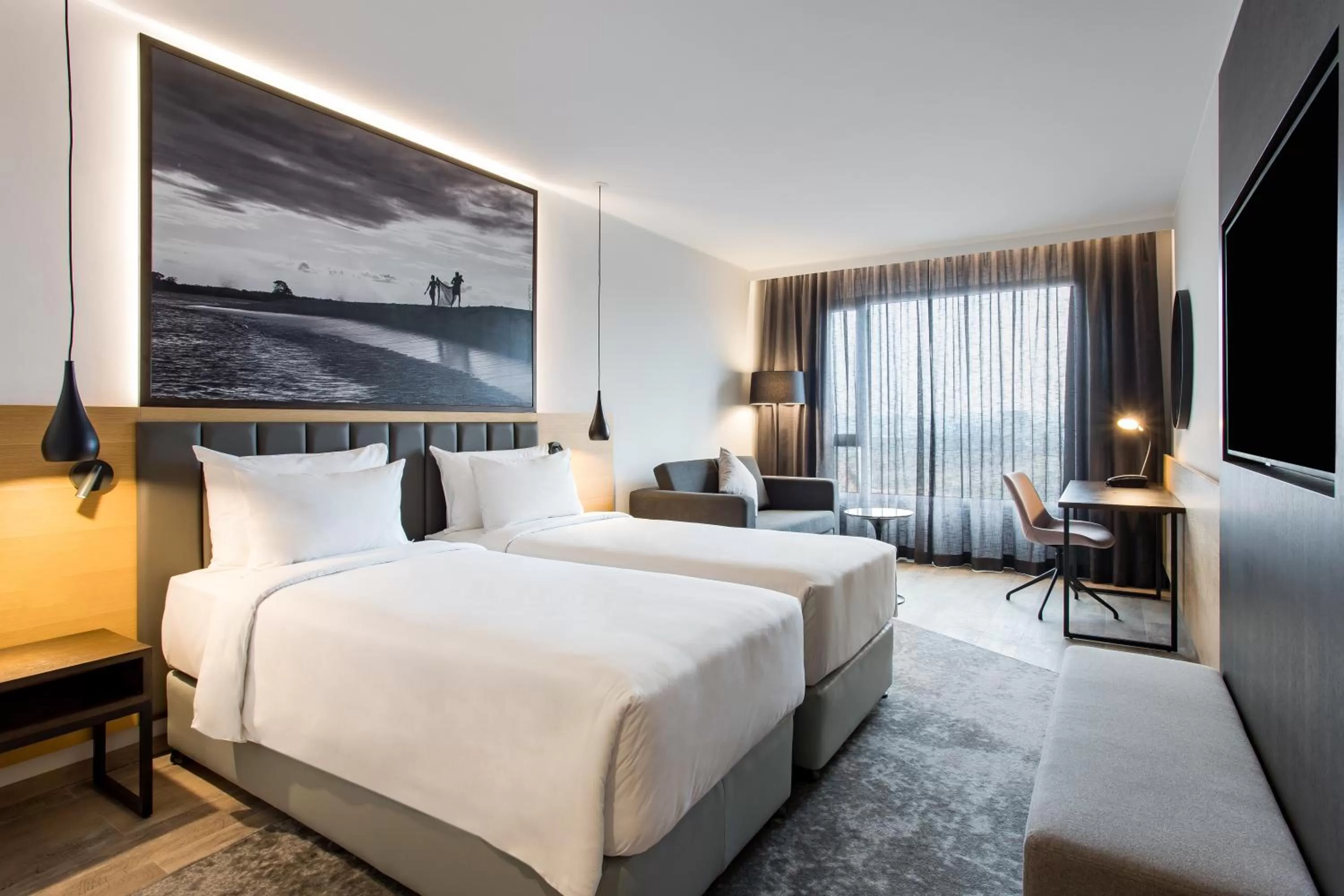 Photo of the whole room, Bed in Radisson Blu Hotel Antananarivo Waterfront