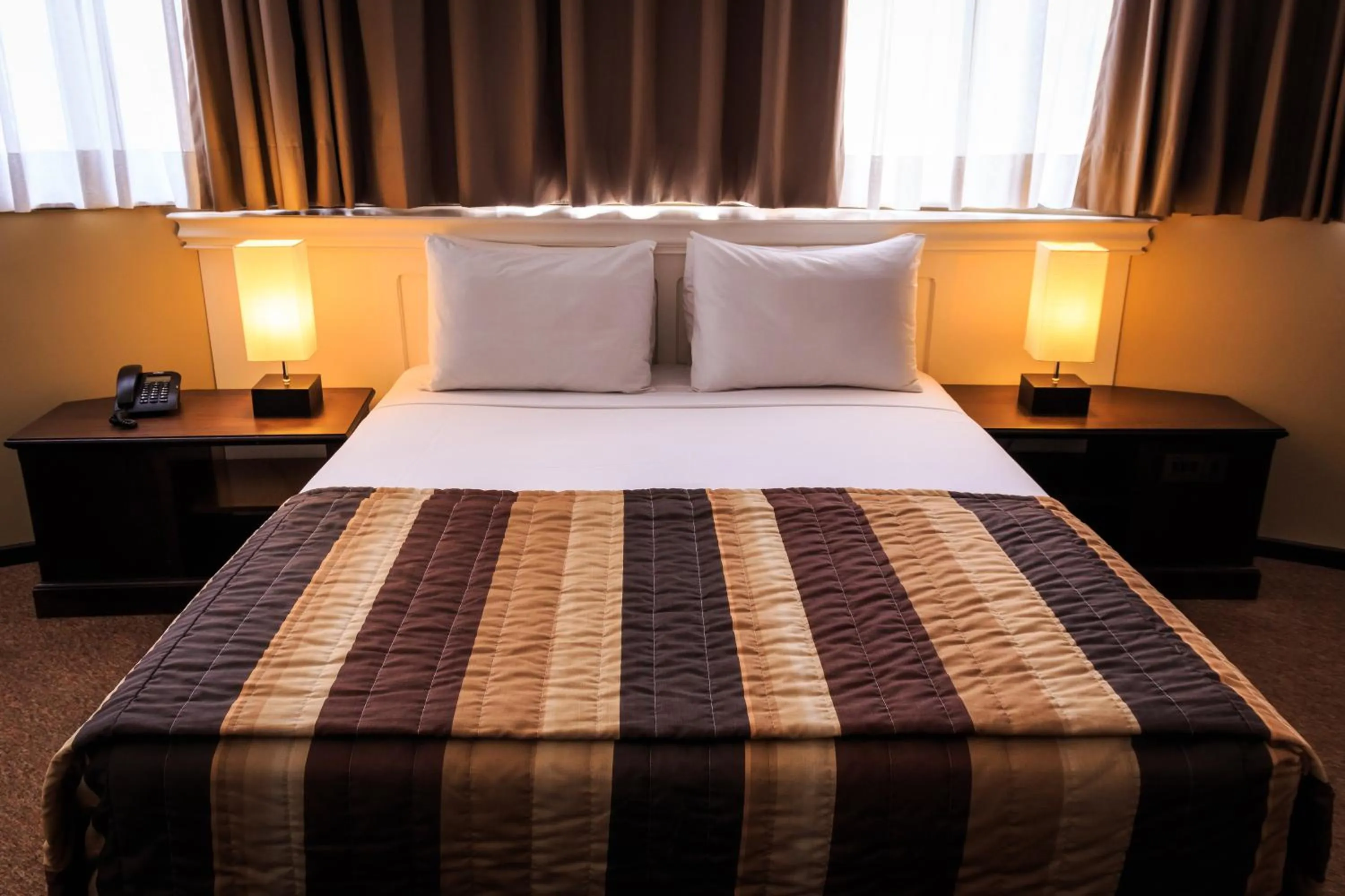 Bed in Marques Plaza Hotel