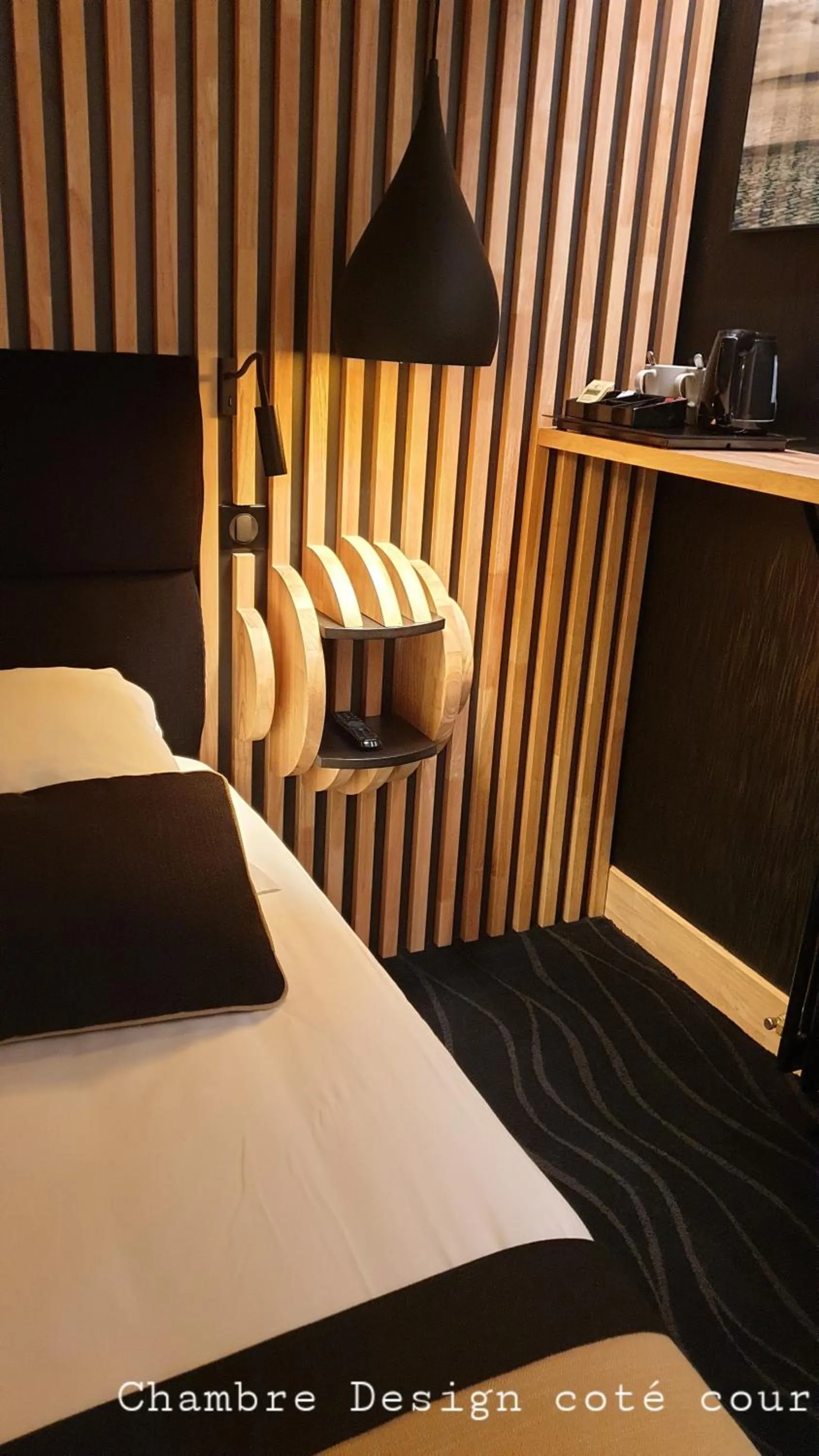 Bedroom in Hôtel Les Brises