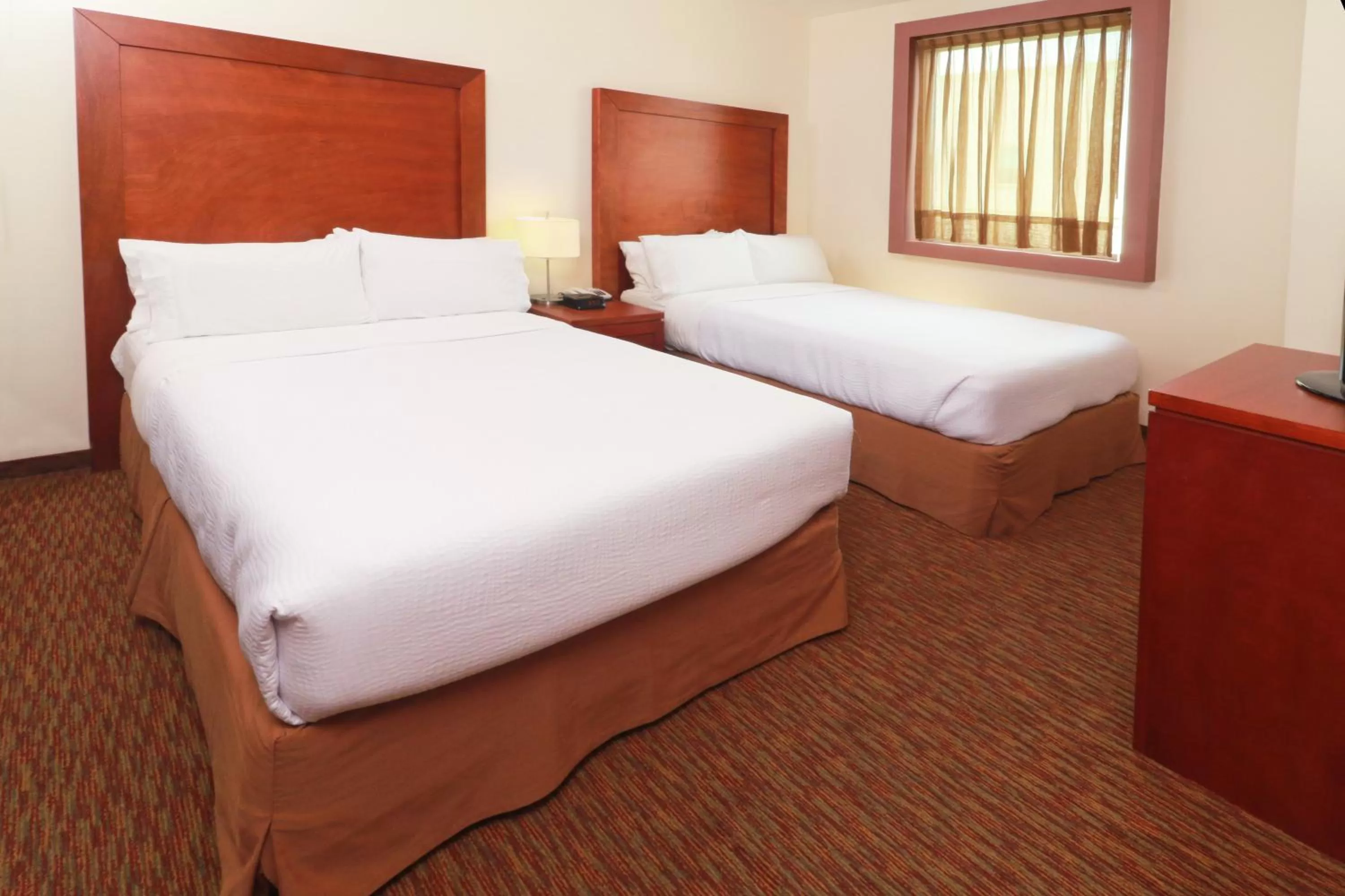 Photo of the whole room, Bed in Staybridge Suites Queretaro by IHG