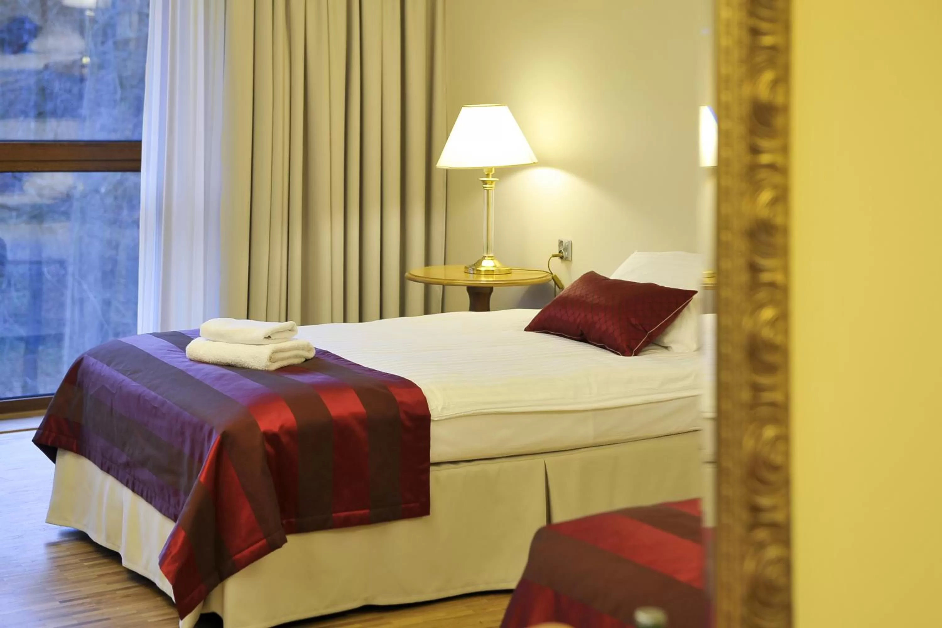 Bed in Hotel Mir-Jan SPA